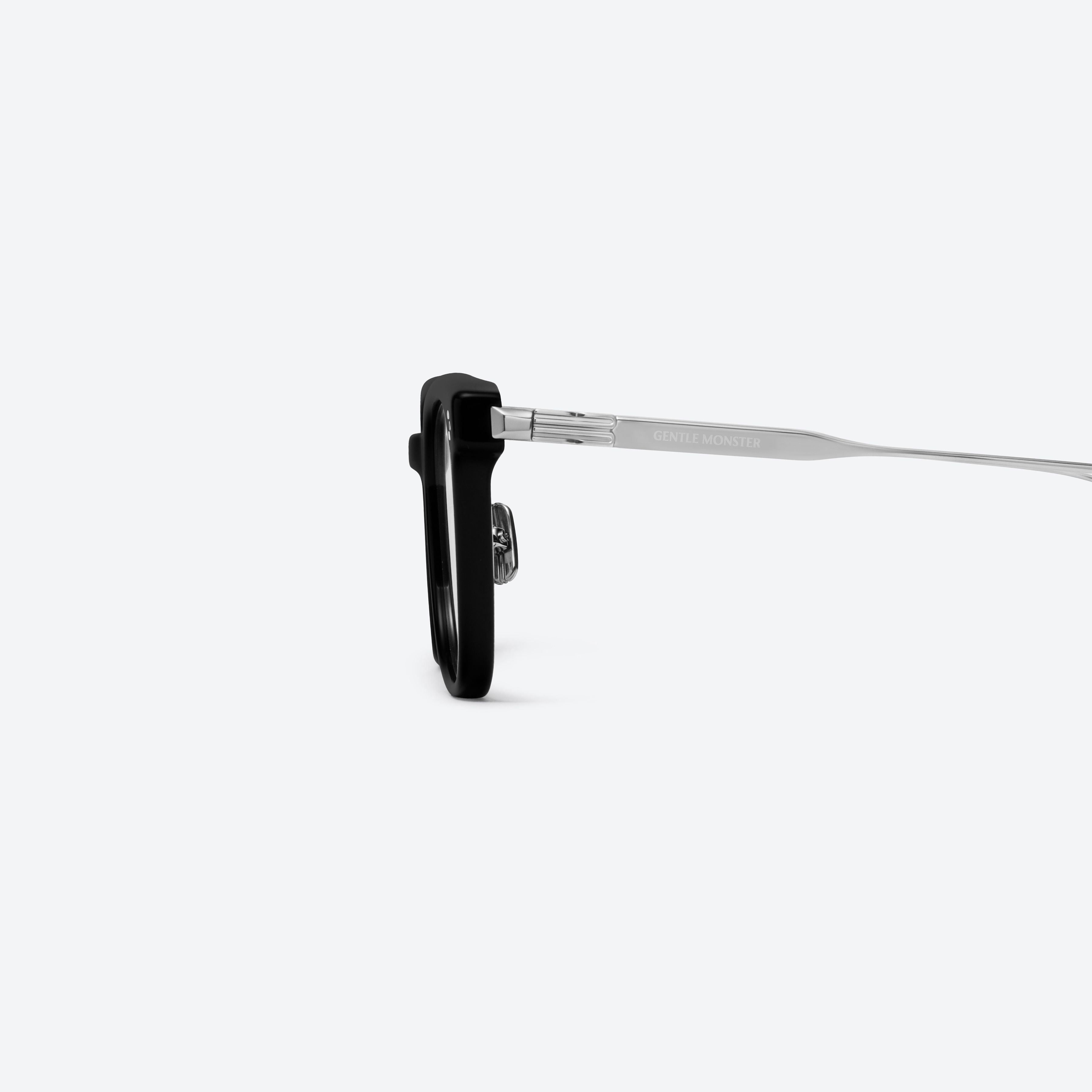 A detailed left view of Gentle Monster Noa 01 Black Mixed framed Square glasses.