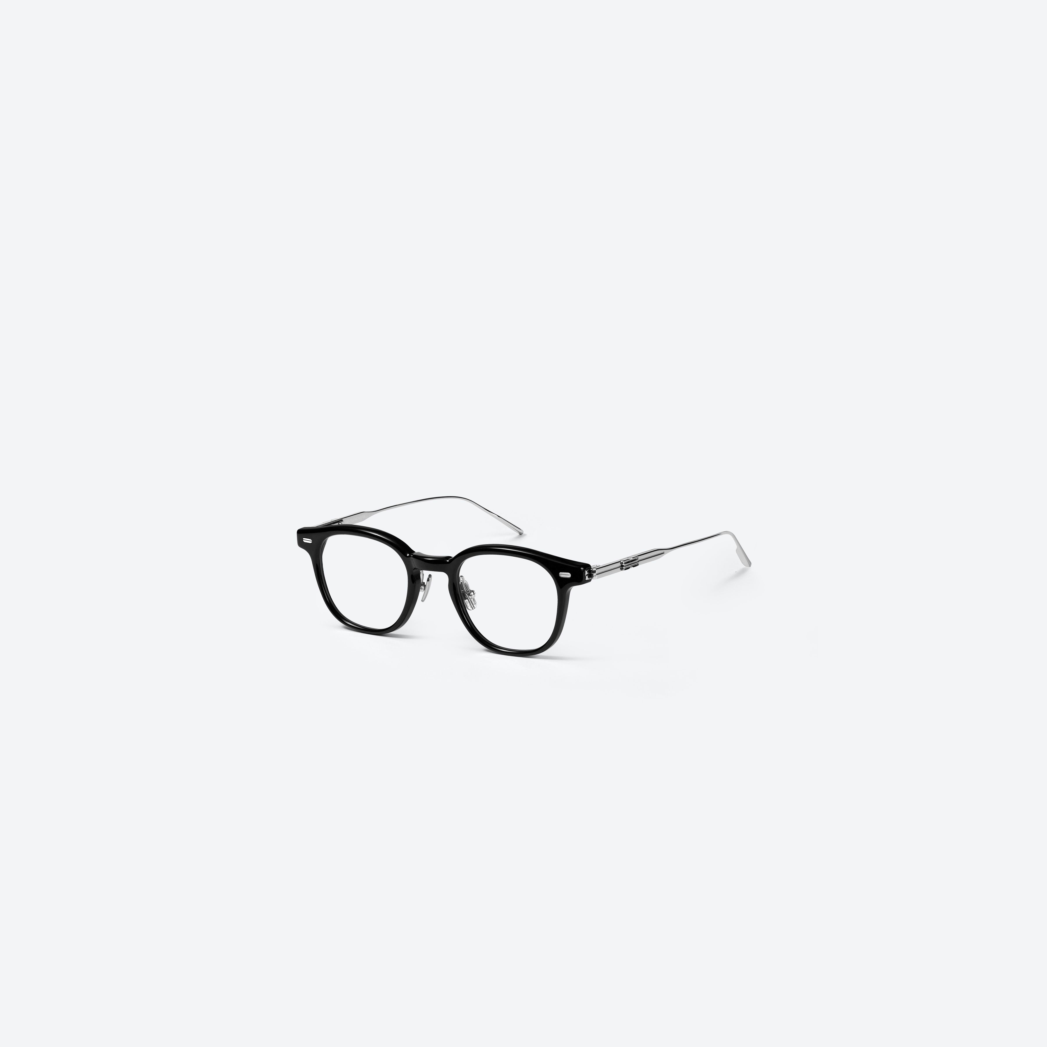 45-degree view of Gentle Monster Odin 01 Black Mixed framed Square glasses.