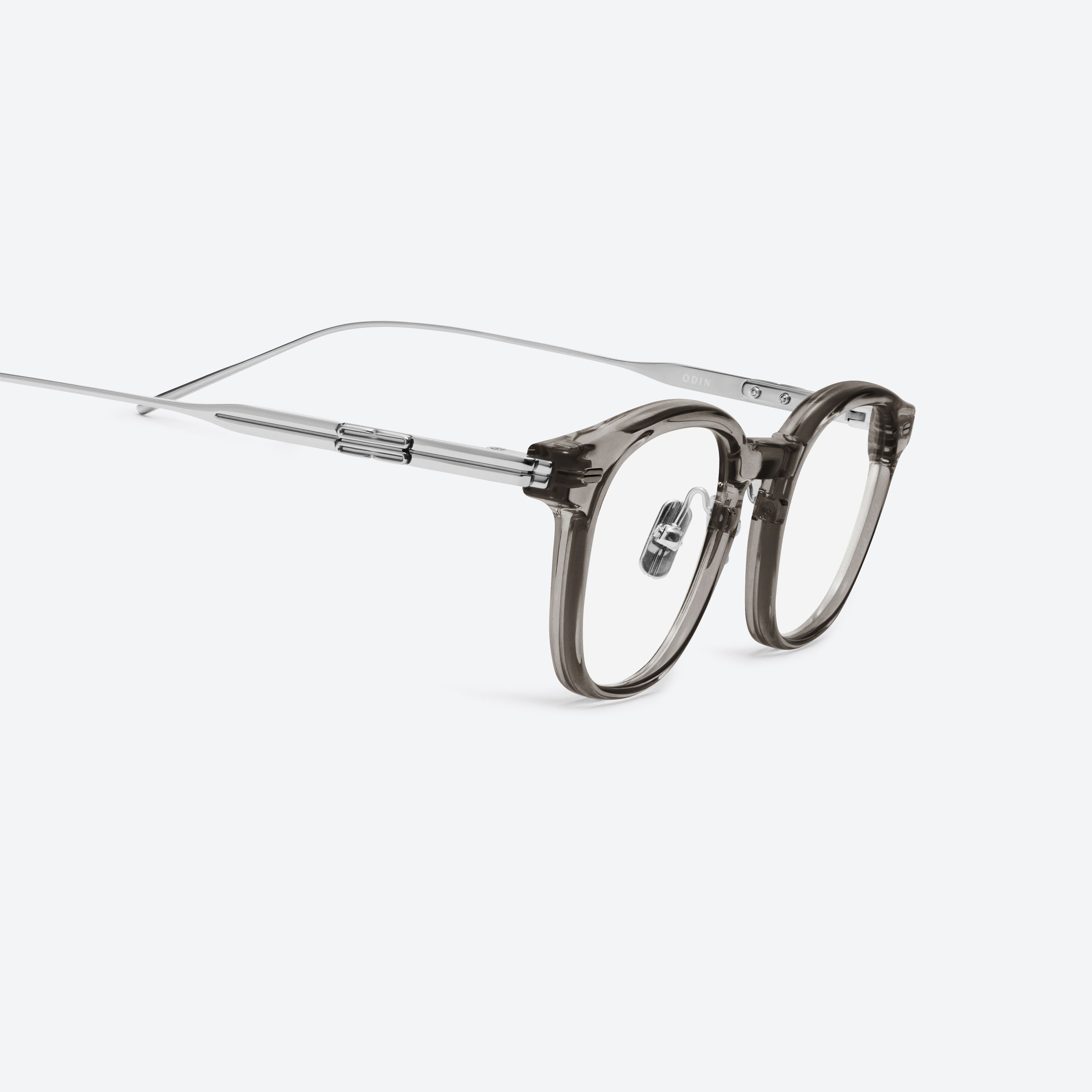 45-degree detailed view of Gentle Monster Odin Brc17 Similar Brown Mixed framed Square glasses.
