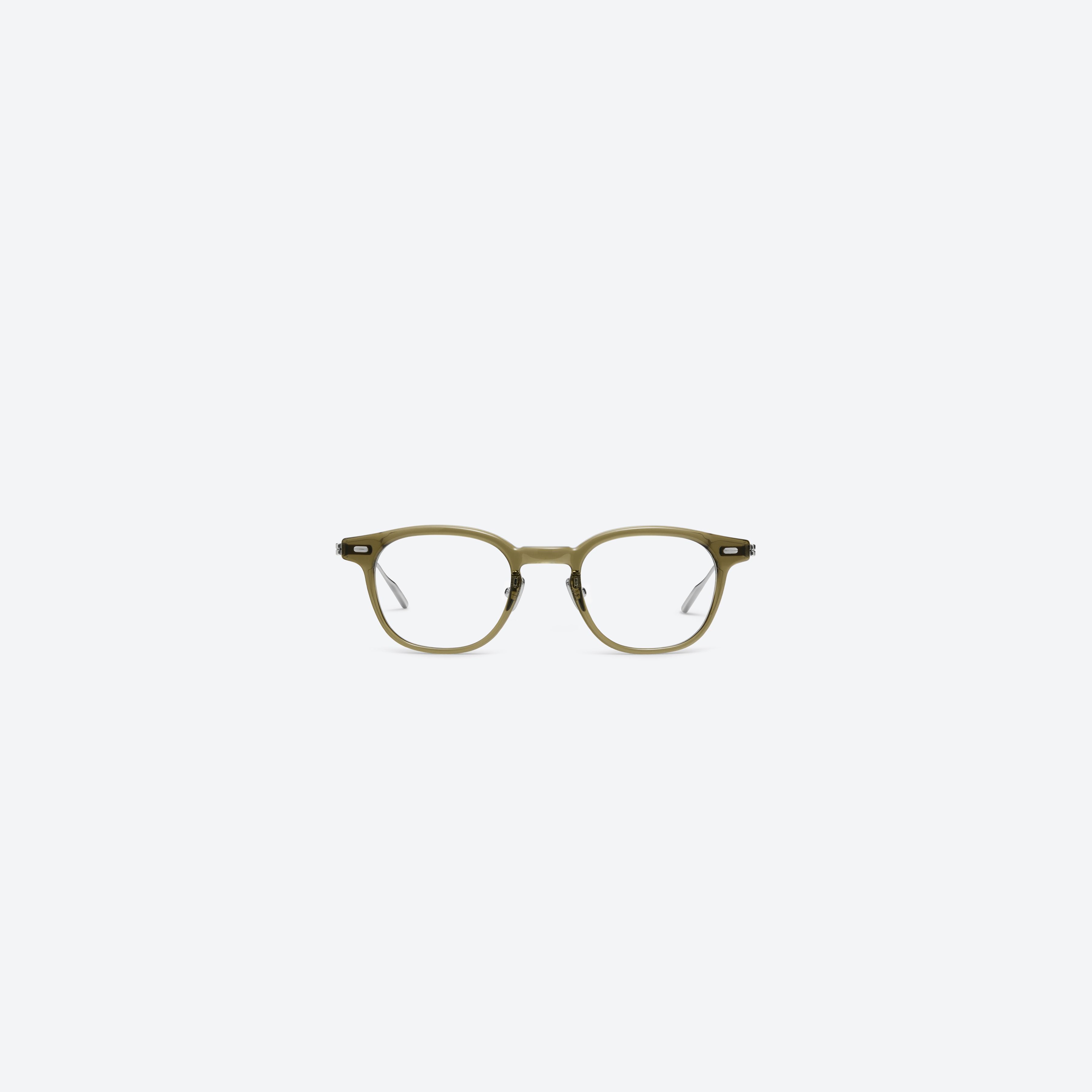 A front view of Gentle Monster Odin Kc1 Green Mixed framed Square glasses.