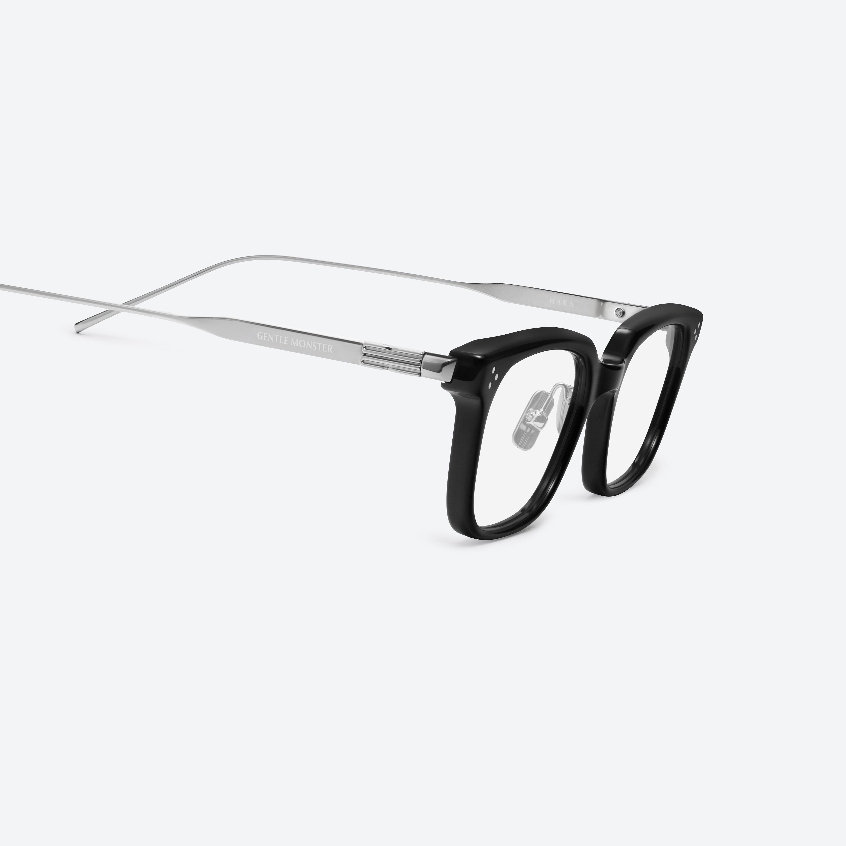 45-degree detailed view of Gentle Monster Haka 01 Black Mixed framed Square glasses.