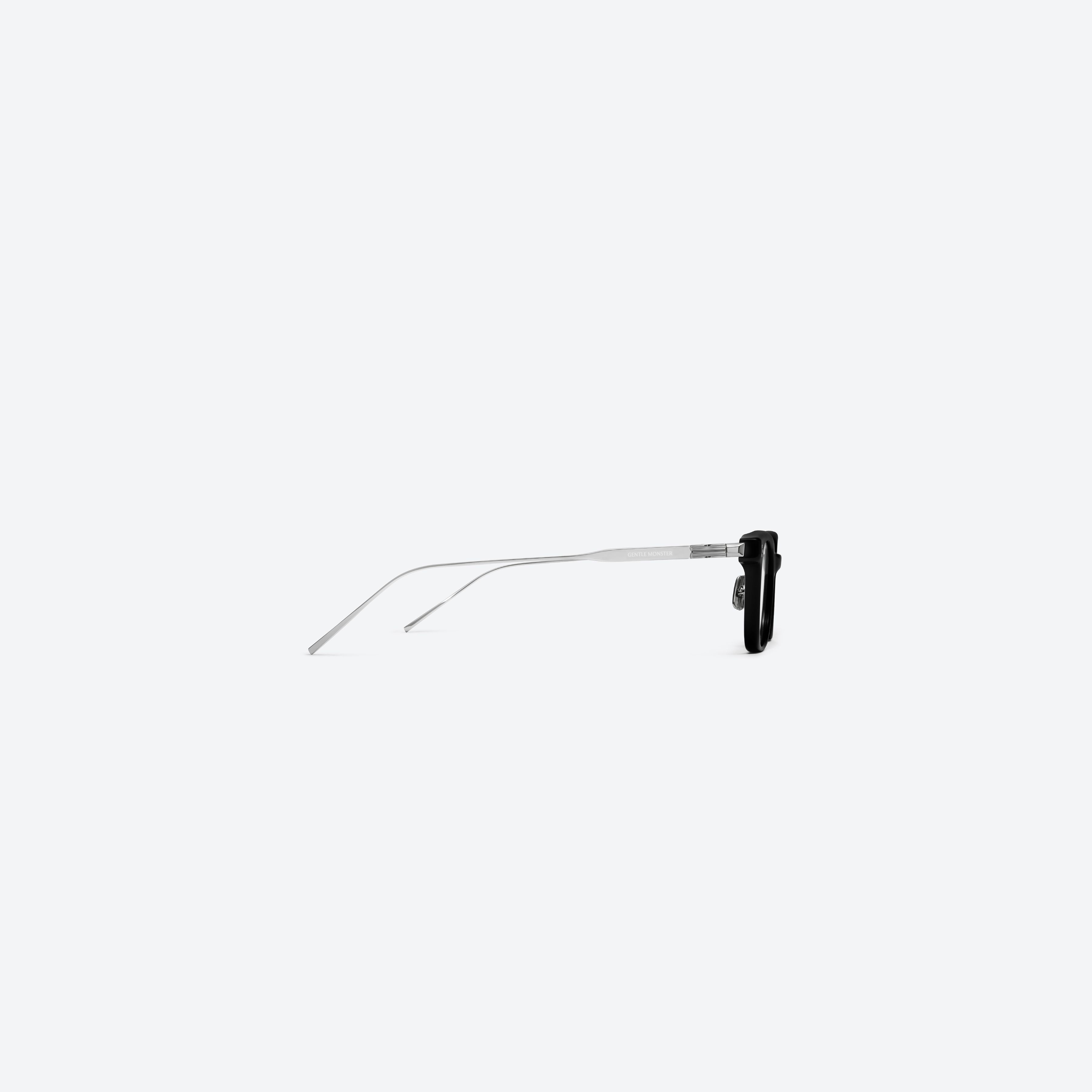 A detailed right view of Gentle Monster Haka 01 Black Mixed framed Square glasses.