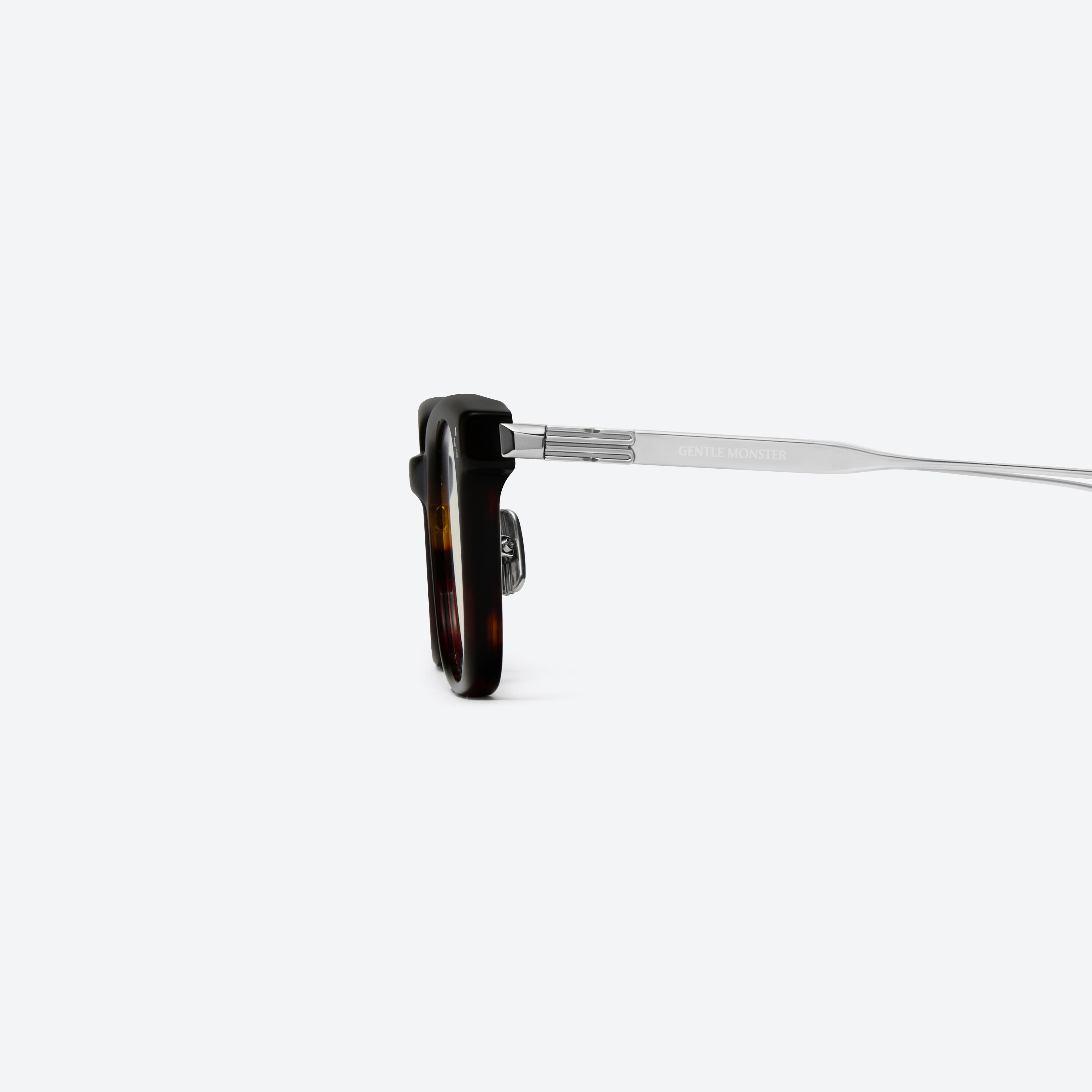 A detailed left view of Gentle Monster Haka T1 Tortoise Mixed framed Square sunglasses.