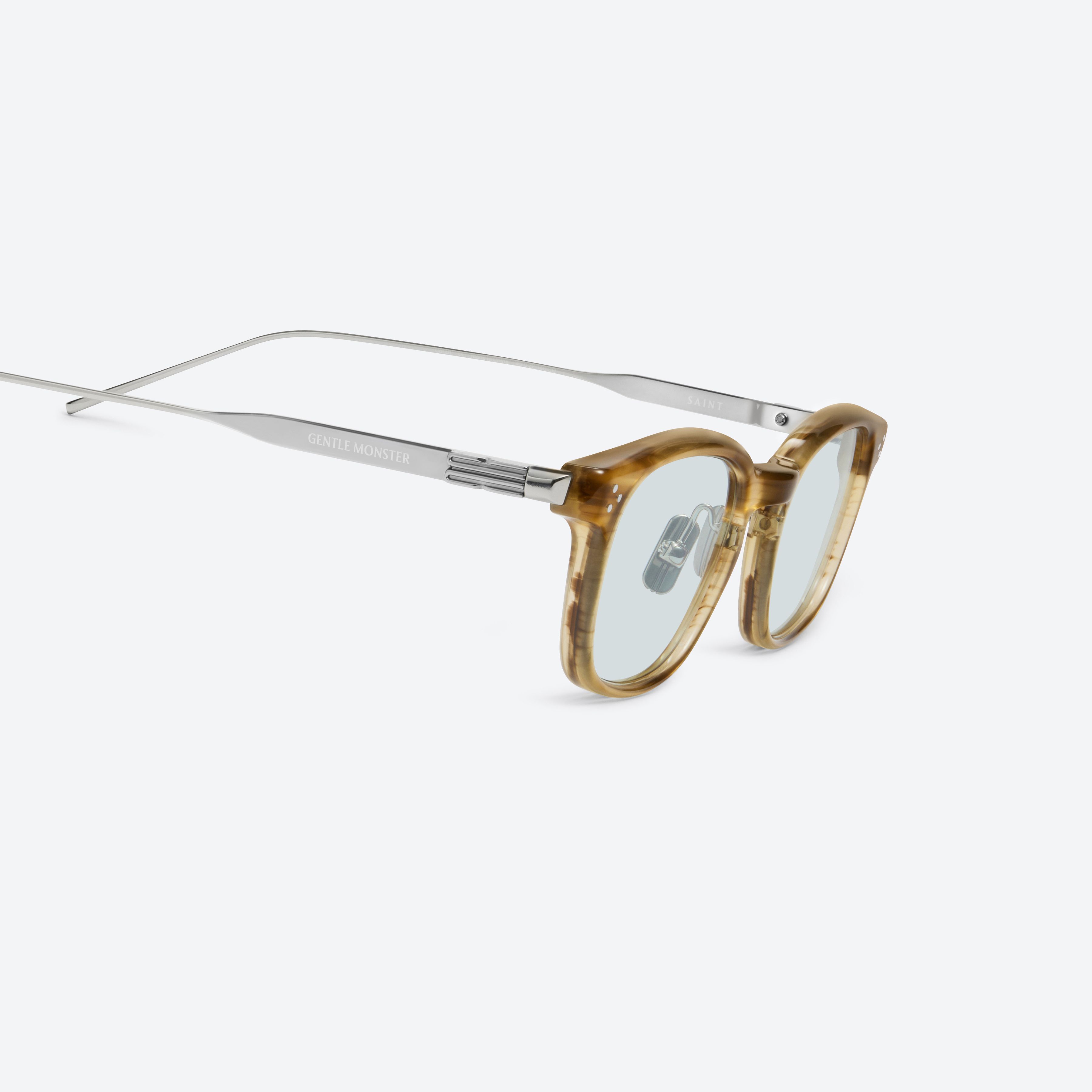 45-degree detailed view of Gentle Monster Saint B1 Brown Mixed framed Square sunglasses.