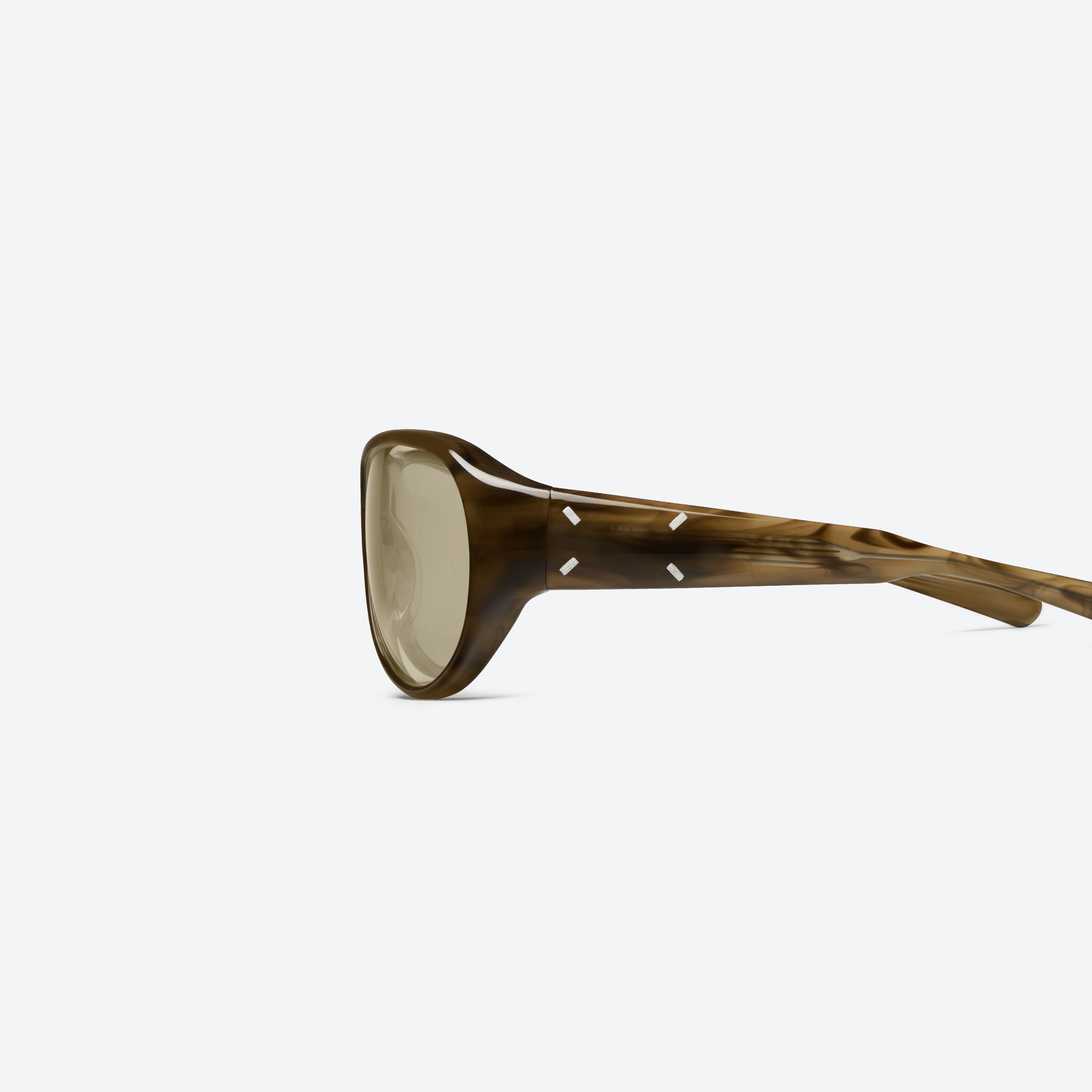 A detailed left view of Gentle Monster Maison Margiela - MM325S T14 Tortoise Acetate framed Aviator sunglasses.