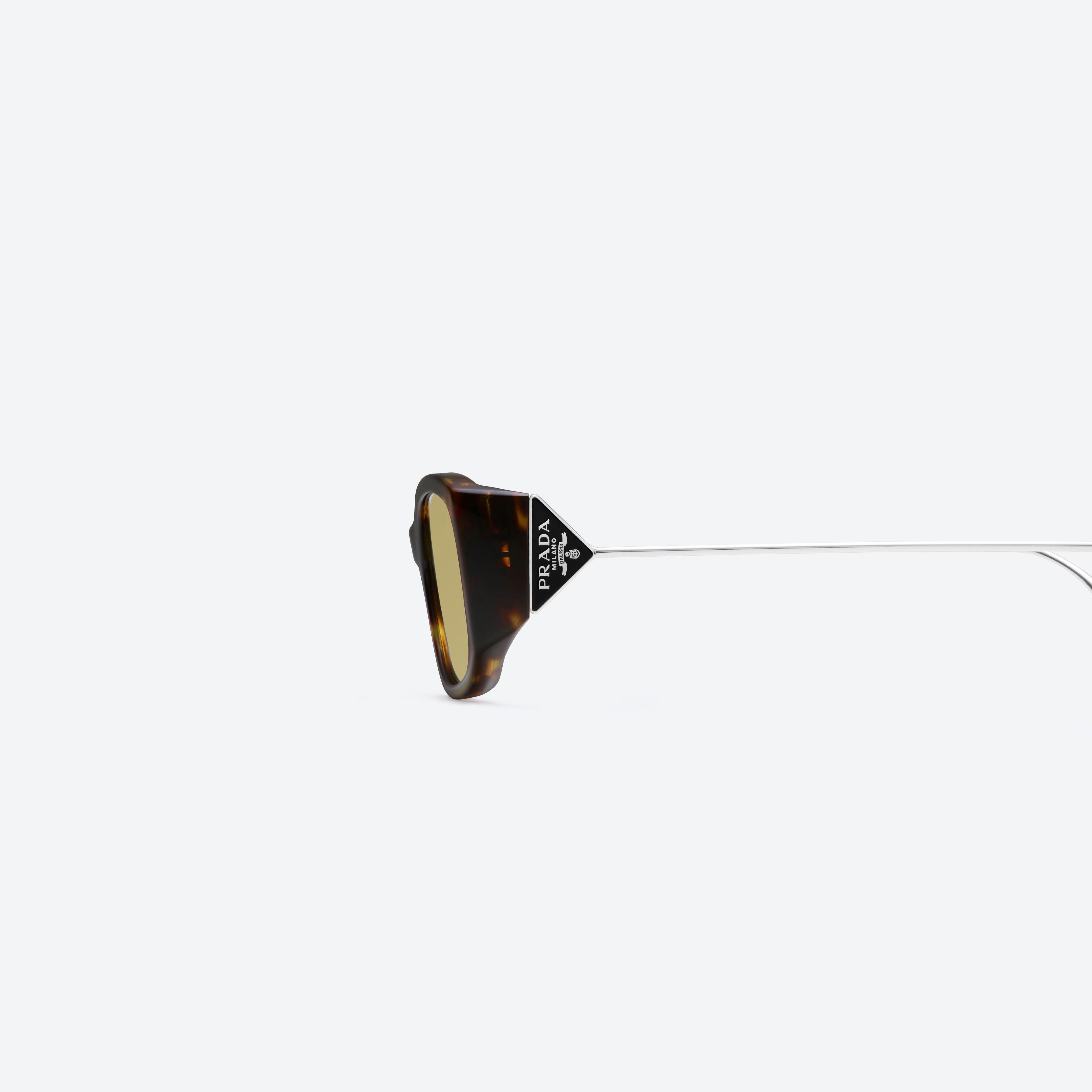 A detailed left view of Gentle Monster Prada Gentle Monster 1 T9 Tortoise Mixed framed Square sunglasses.