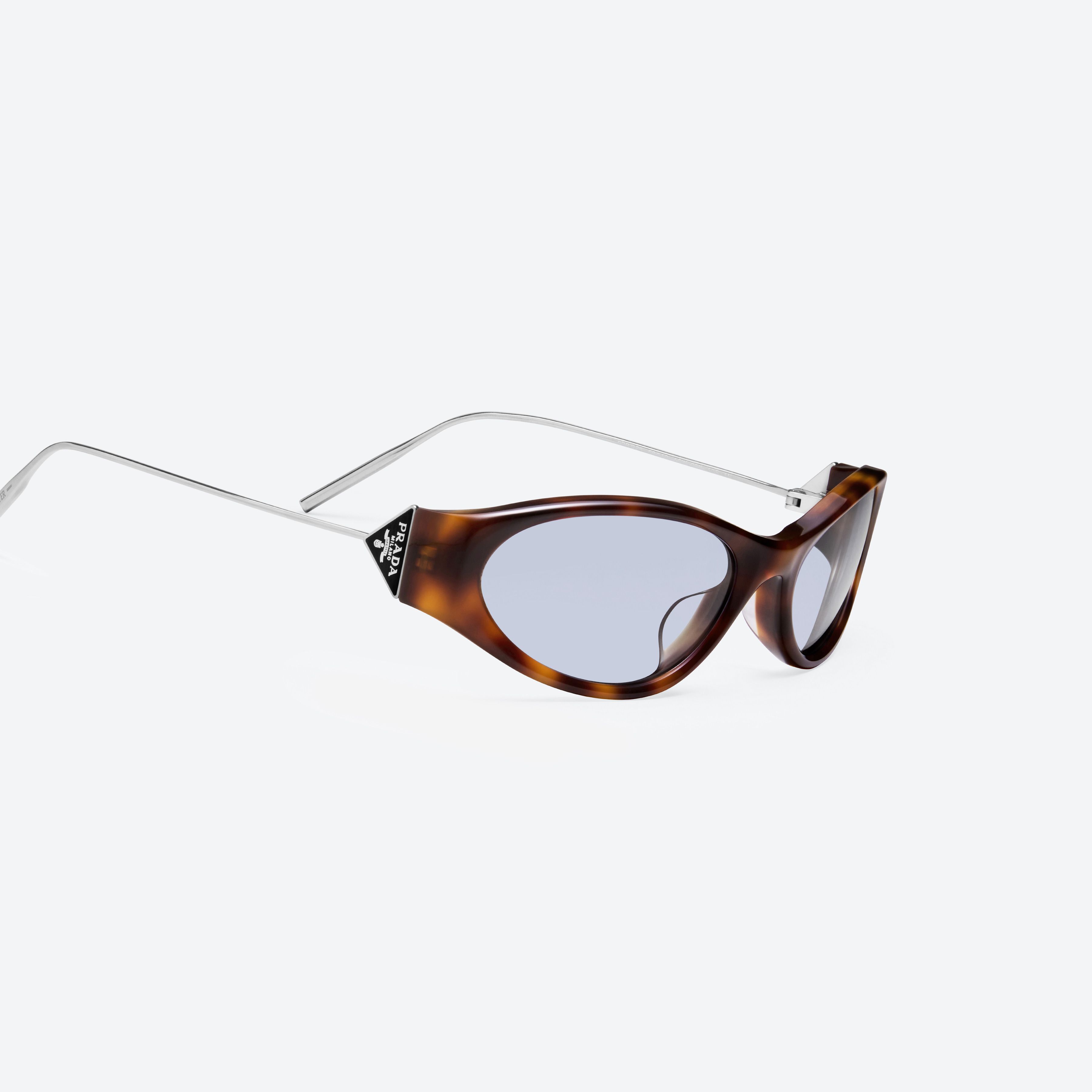 45-degree detailed view of Gentle Monster Prada Gentle Monster 3 L2 Tortoise Mixed framed Oval sunglasses.
