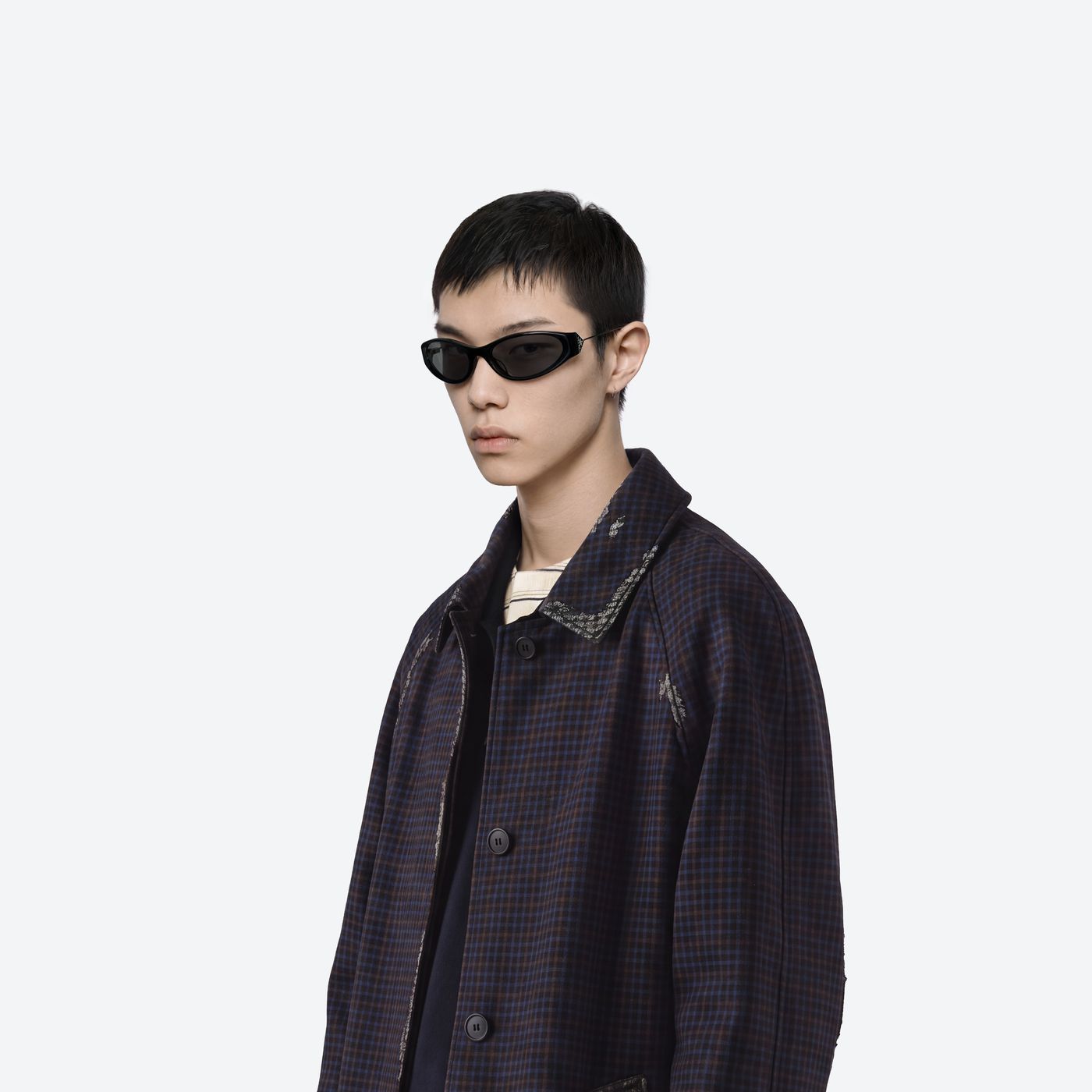 Model wearing the Prada Gentle Monster 3 01 Black Mixed framed Oval sunglasses.