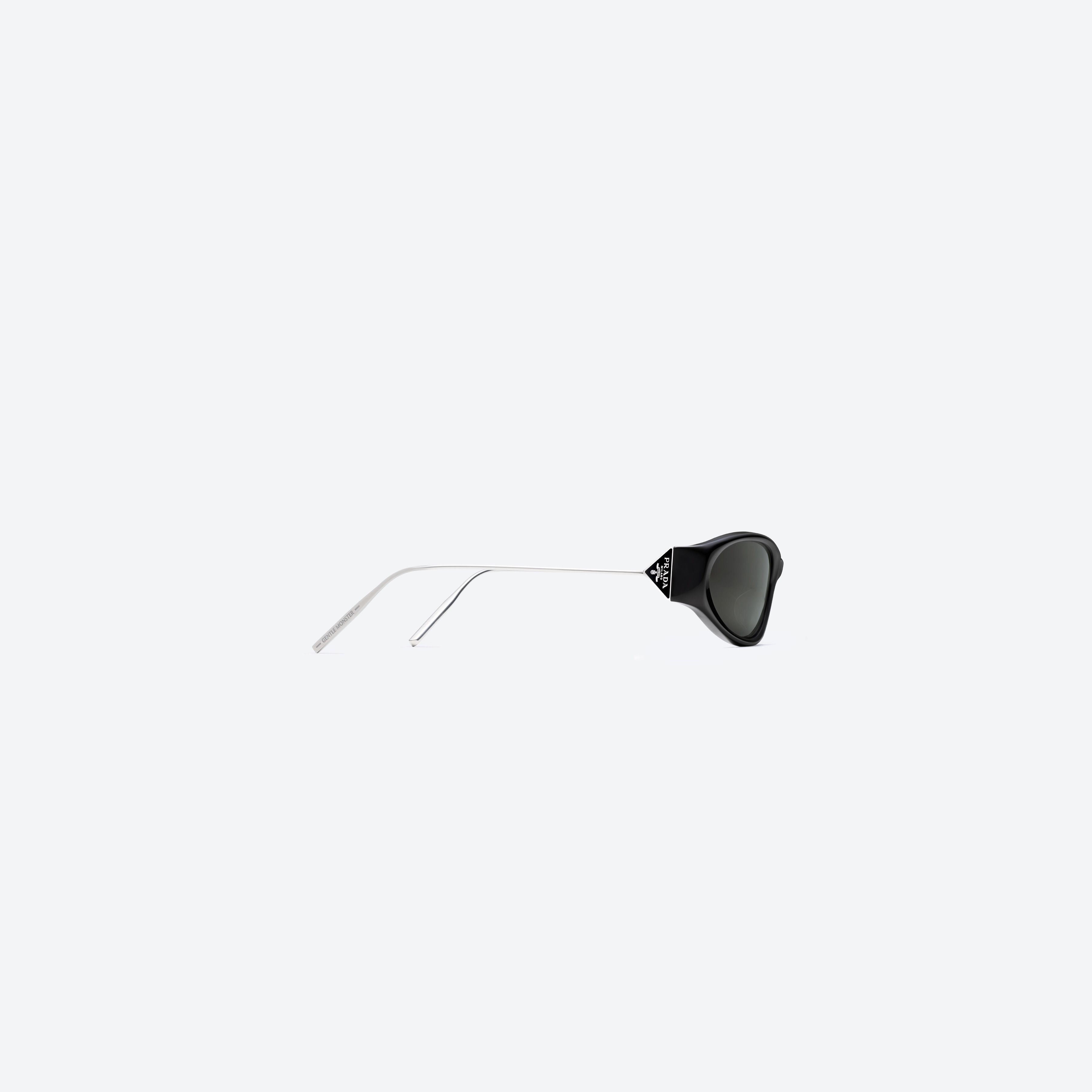 A detailed right view of Gentle Monster Prada Gentle Monster 3 01 Black Mixed framed Oval sunglasses.