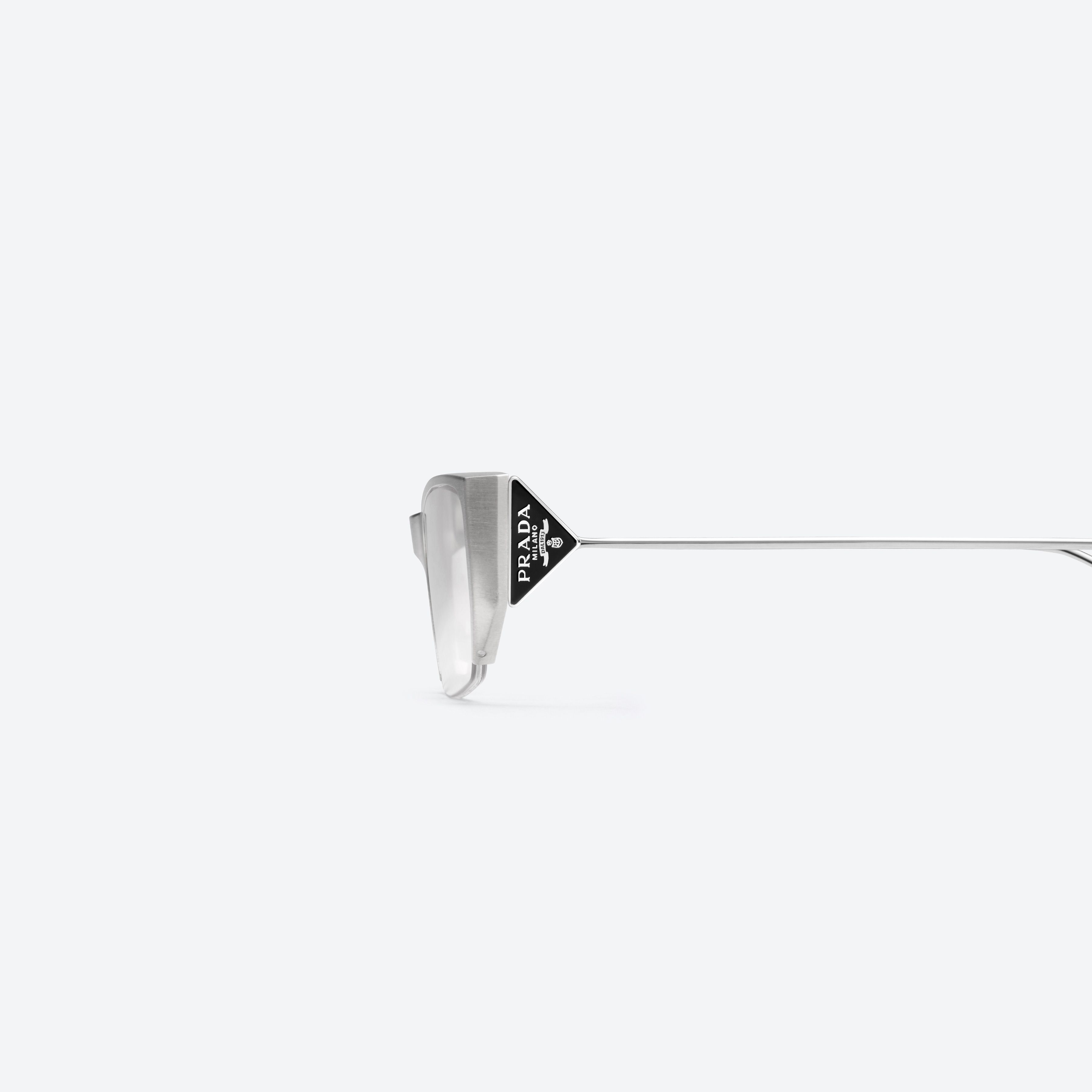 A detailed left view of Gentle Monster Prada Gentle Monster 2 A02 Silver Metal framed Square glasses.