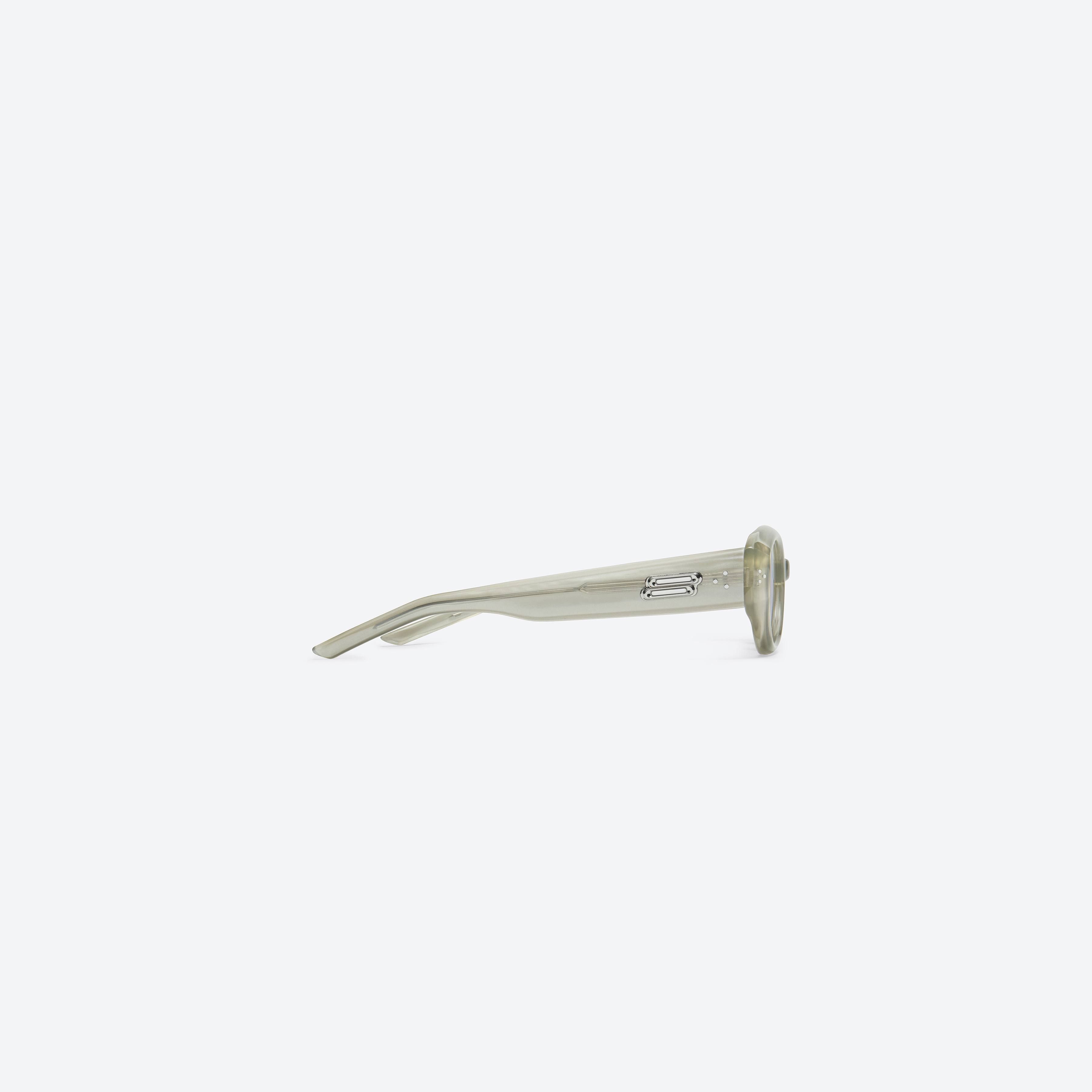 A detailed right view of Gentle Monster Void GC10 Gray Acetate framed Oval sunglasses.