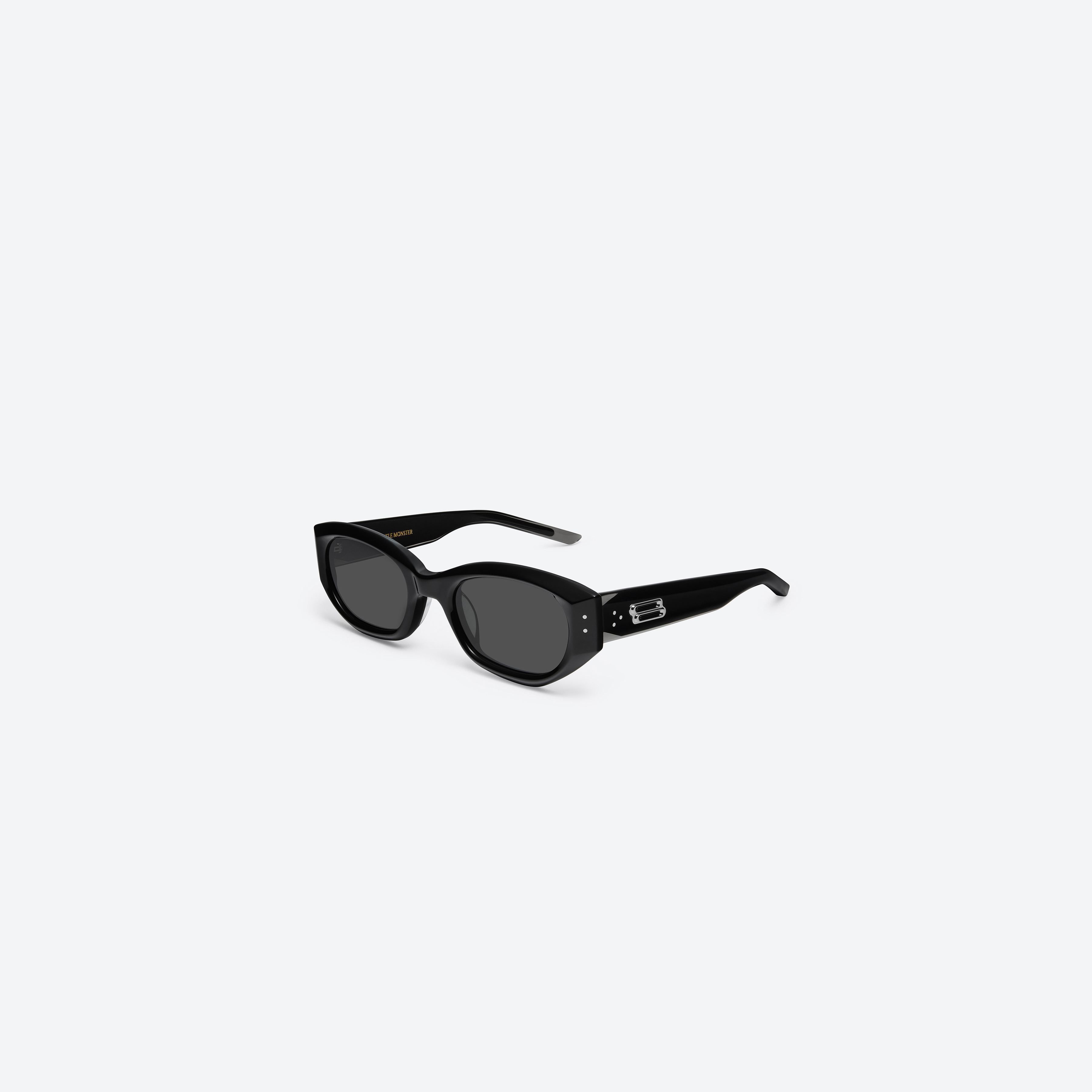 45-degree view of Gentle Monster BENVEN 01 Black Acetate framed Oval sunglasses.