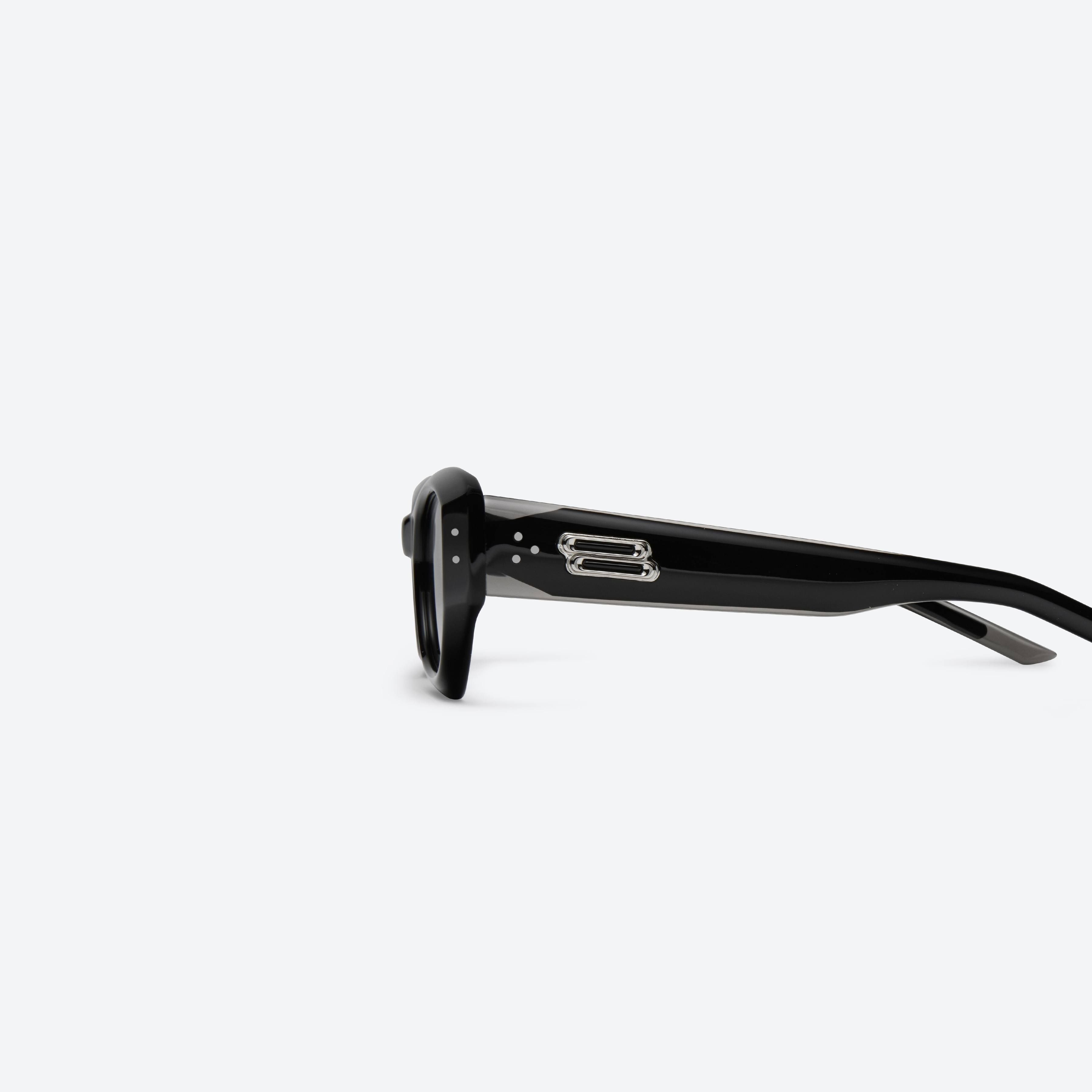 A detailed left view of Gentle Monster BENVEN 01 Black Acetate framed Oval sunglasses.
