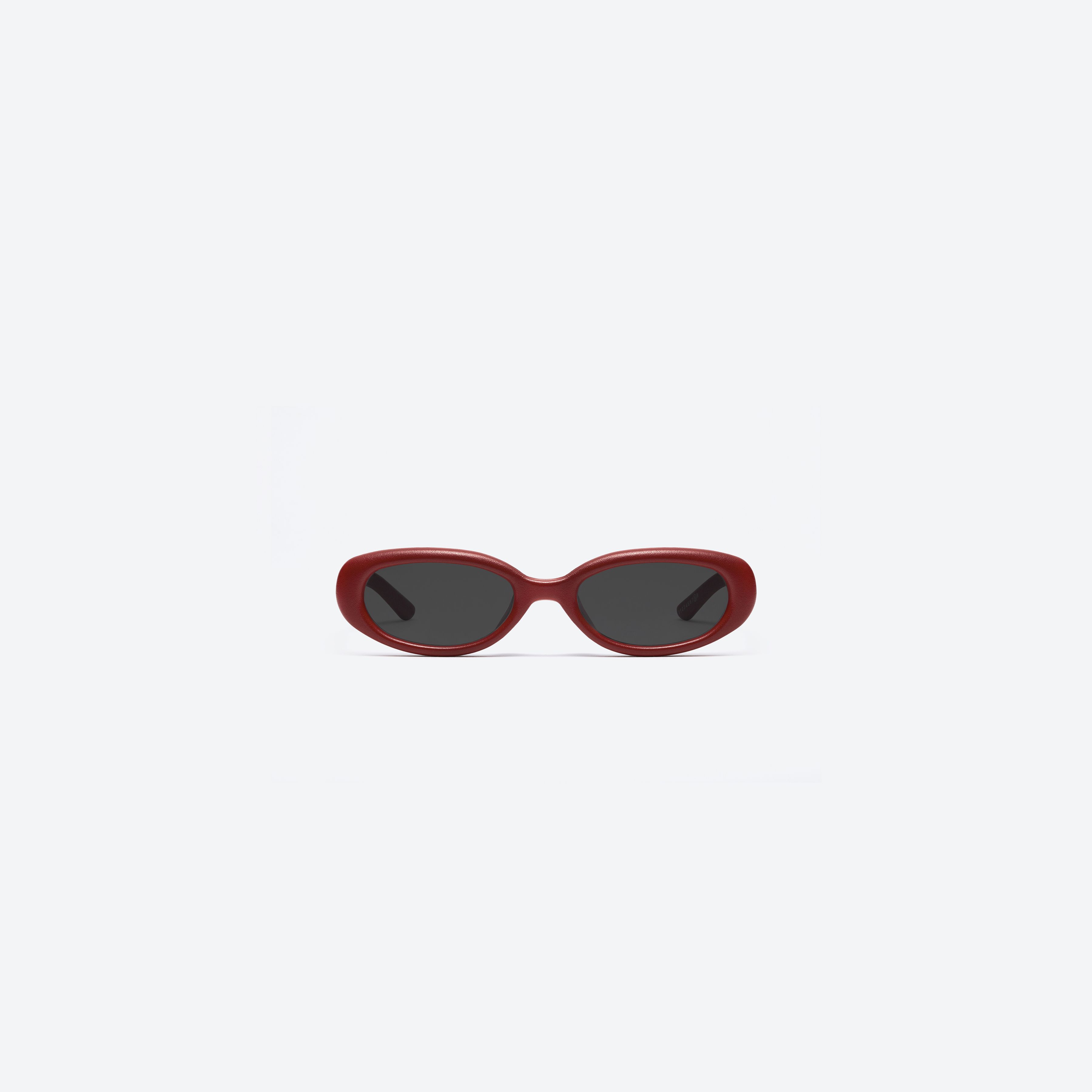 A front view of Gentle Monster MM206 LEATHER LR1 Red Acetate framed Oval sunglasses.