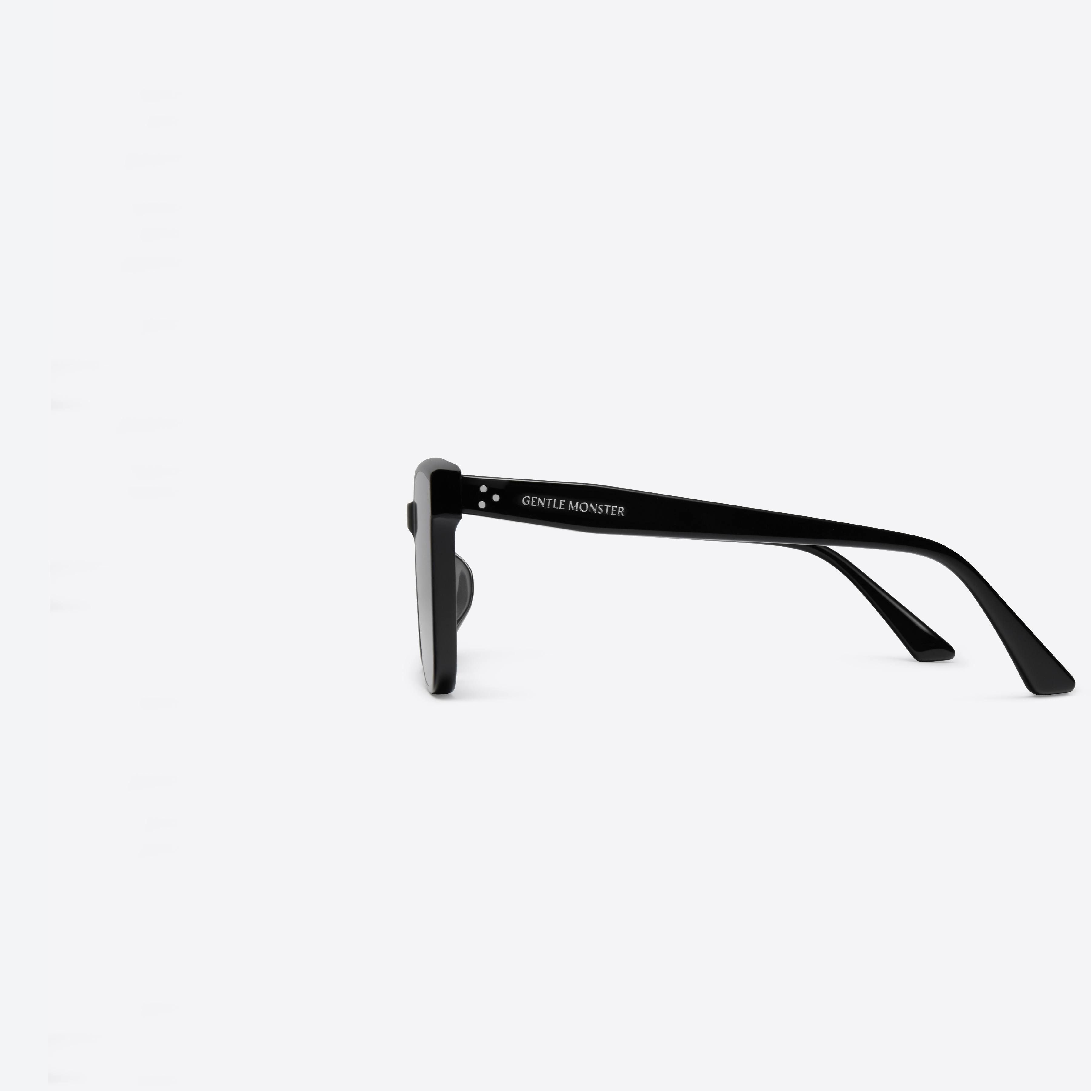 A detailed left view of Gentle Monster Alan 01 Black Acetate framed Square sunglasses.