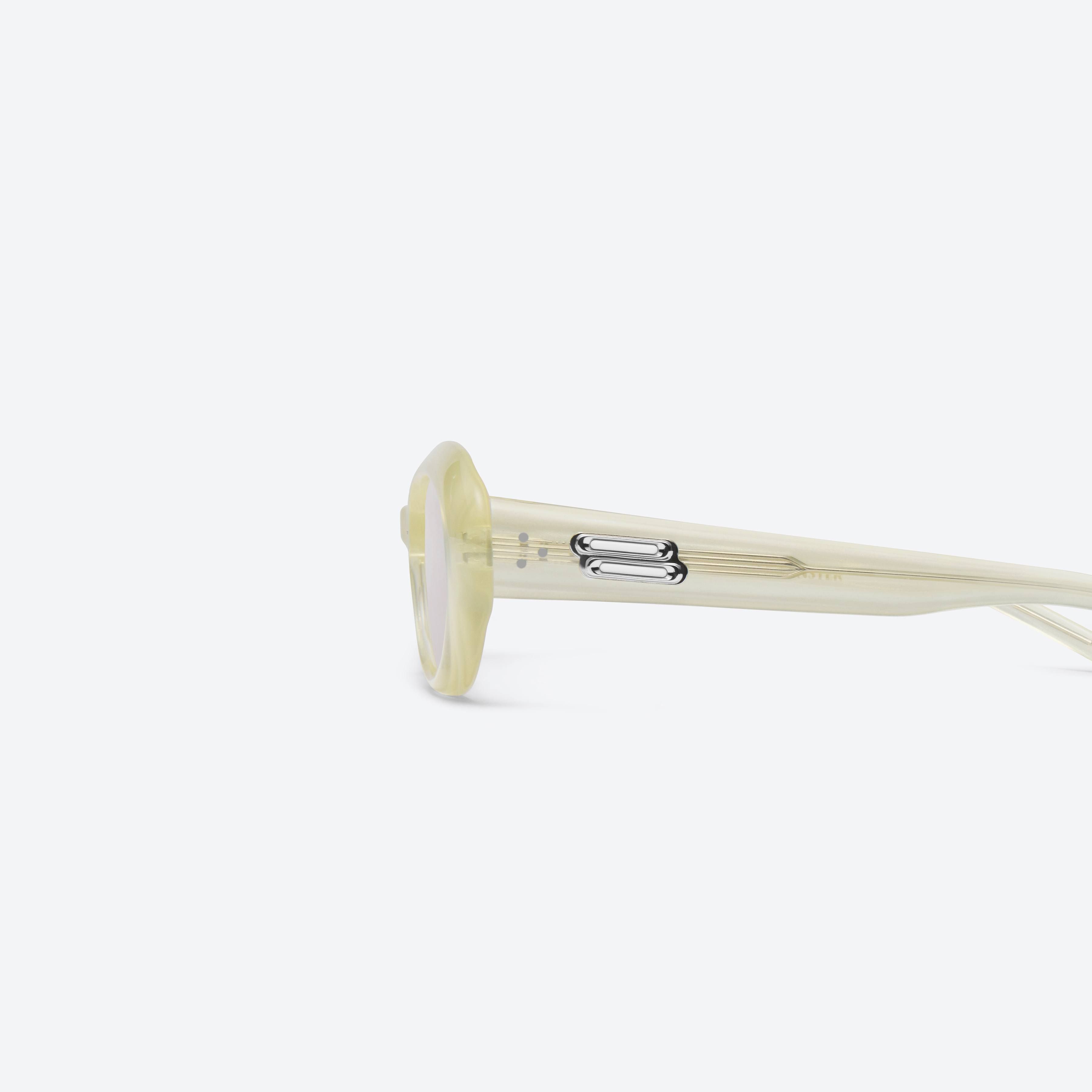 A detailed left view of Gentle Monster Molta YC9 Yellow Acetate framed Oval sunglasses.