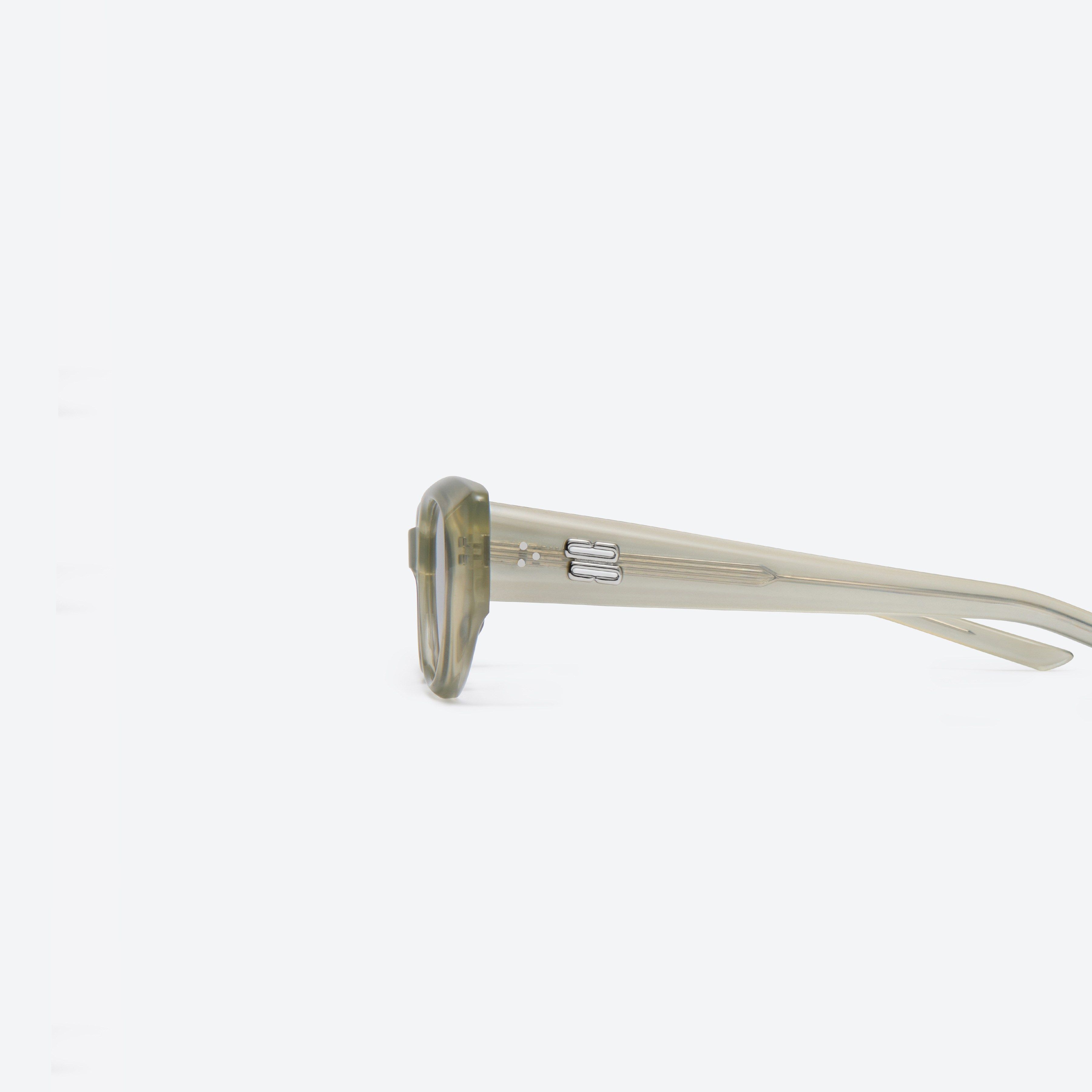 A detailed left view of Gentle Monster Monta GC10 Gray Acetate framed Square sunglasses.