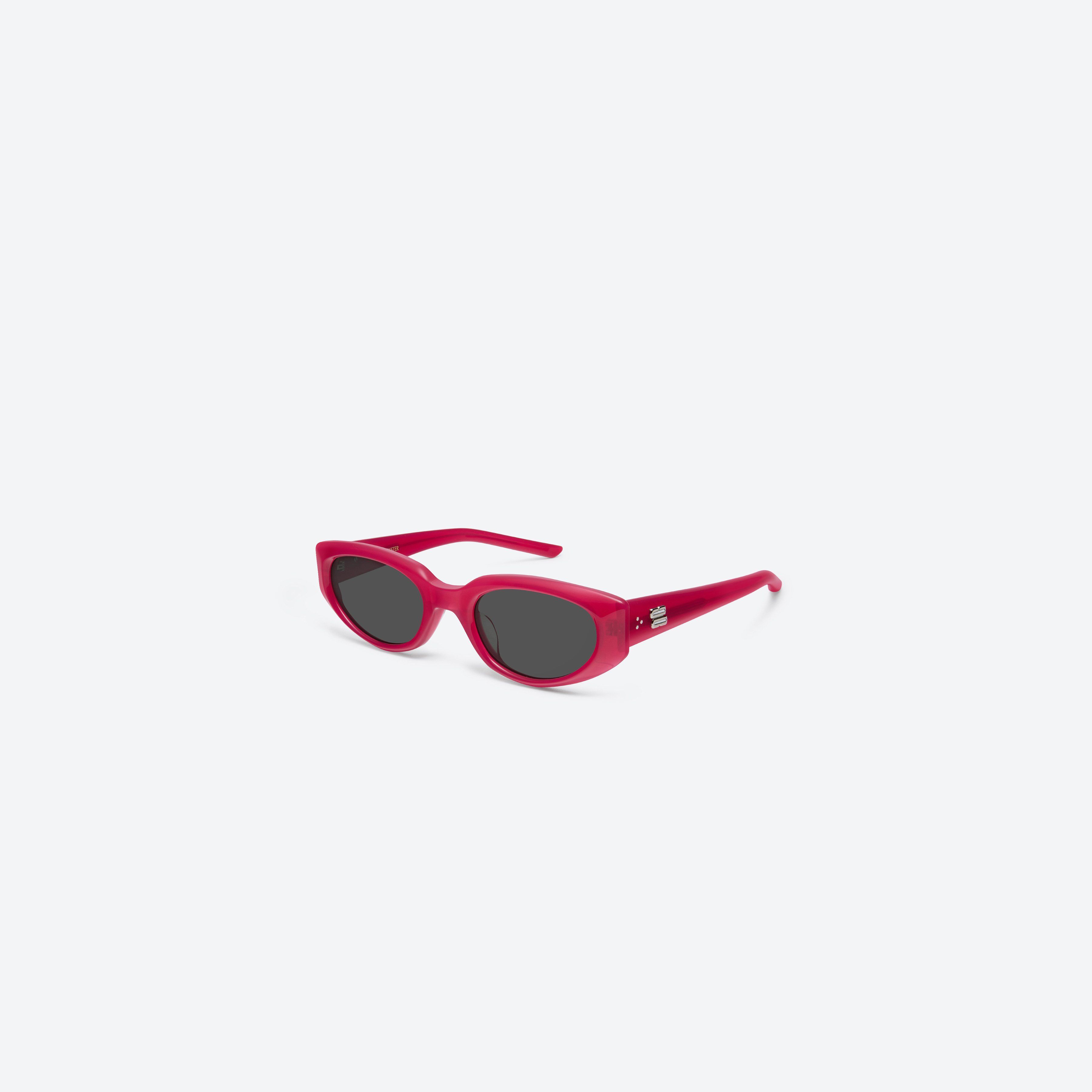 45-degree view of Gentle Monster Monta RC6 Red Acetate framed Square sunglasses.