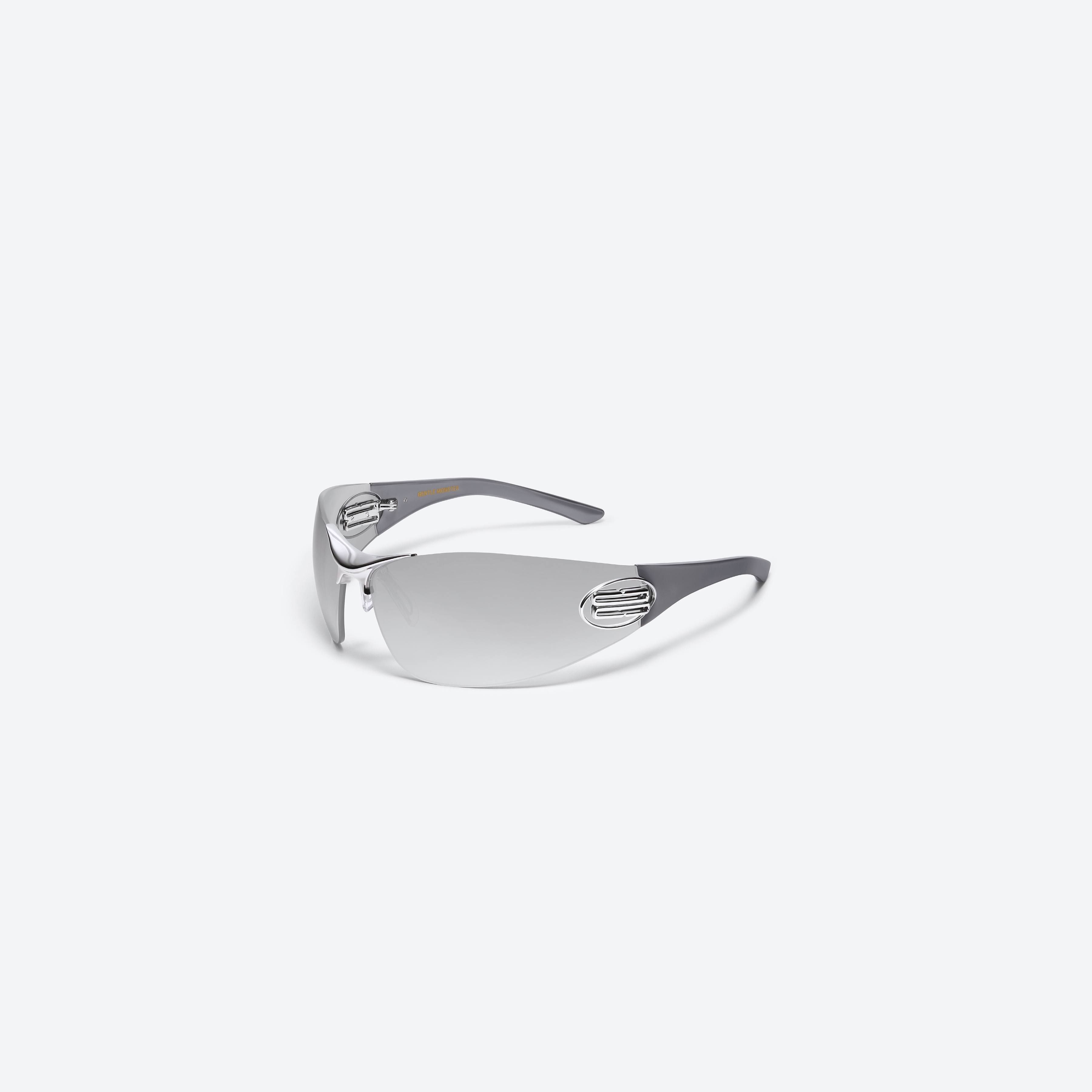 45-degree view of Gentle Monster Meta 02(G) Silver Mixed framed Wraparound sunglasses.