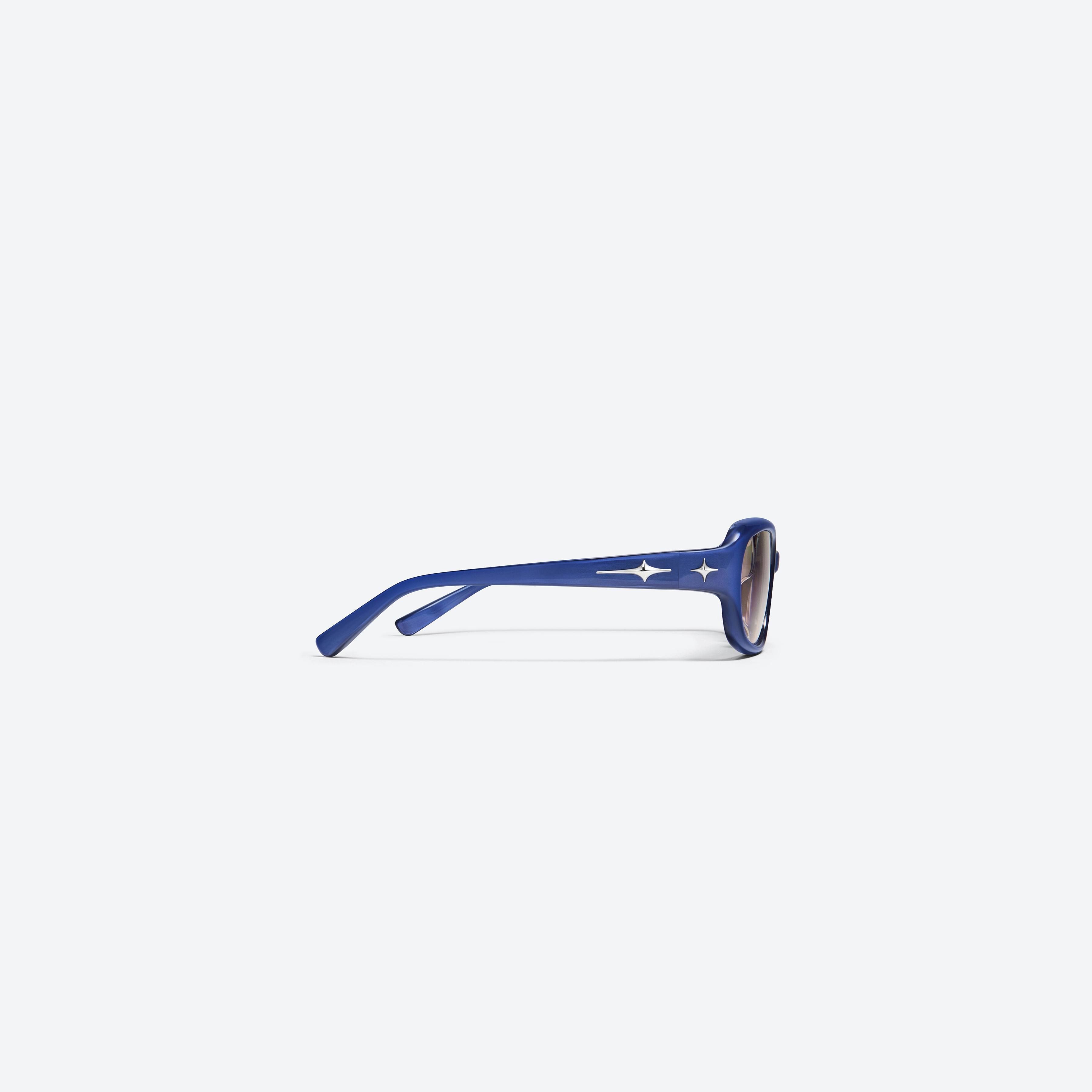 A detailed right view of Gentle Monster Noizer N5 Blue Acetate framed Square glasses.
