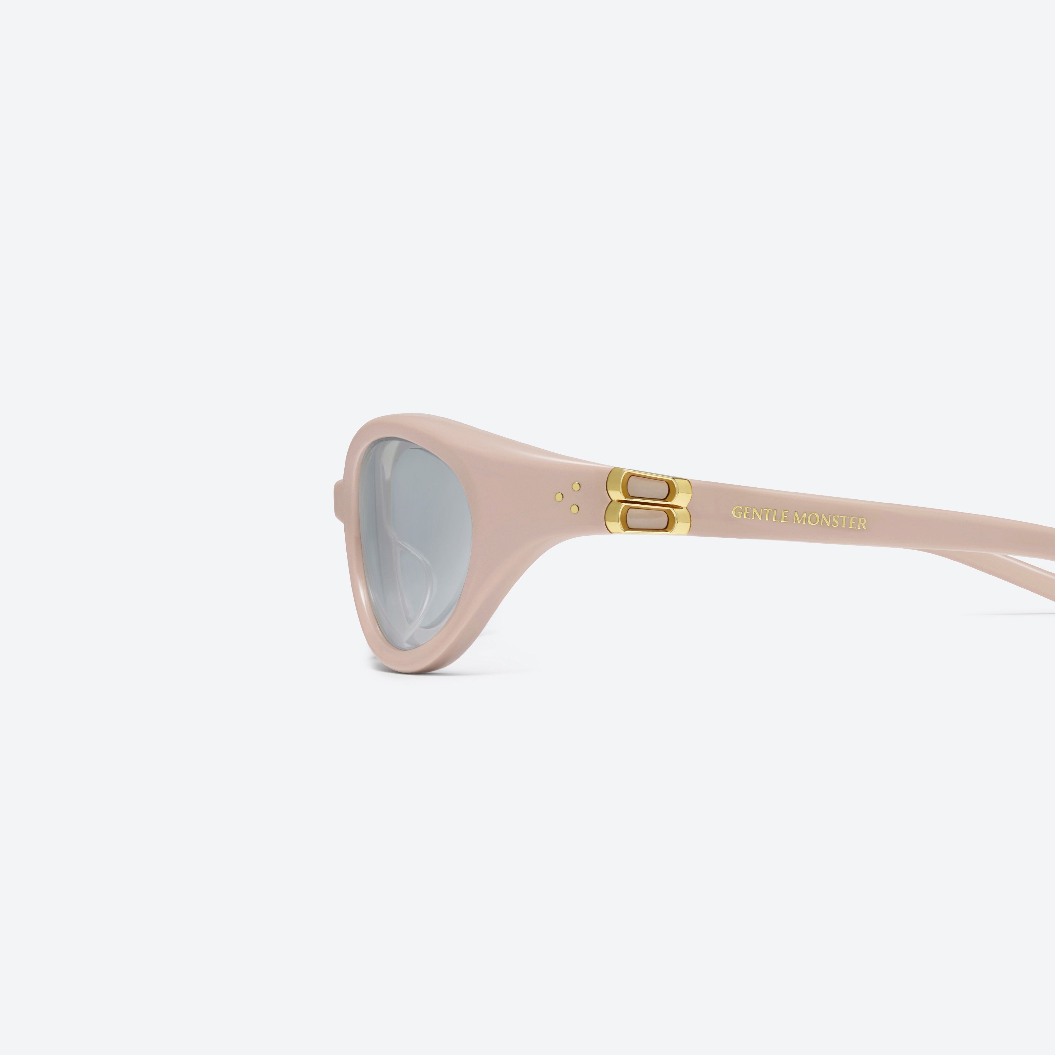 A detailed left view of Gentle Monster Ion P7 Pink Acetate framed Wraparound sunglasses.