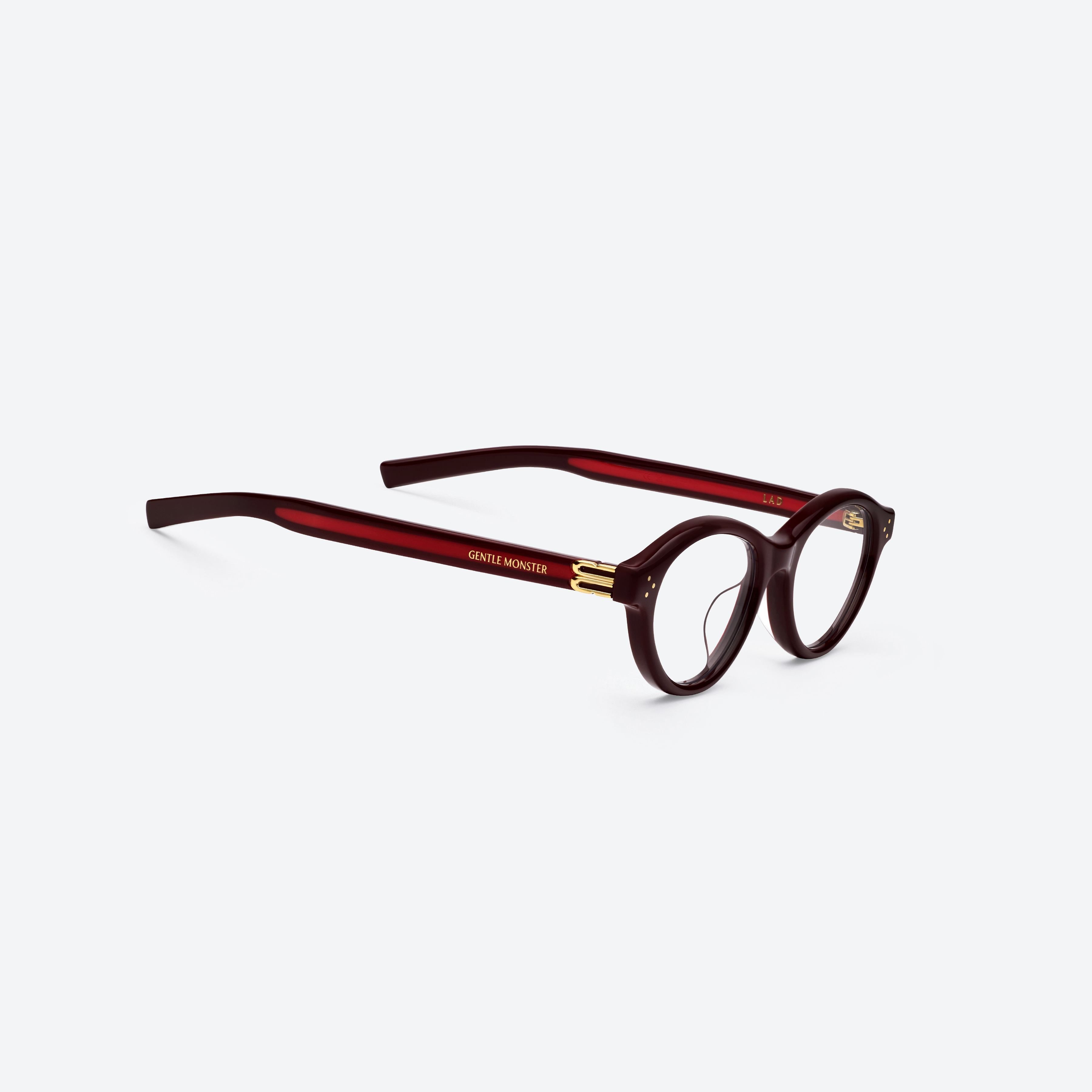 45-degree detailed view of Gentle Monster Lad R7 Red Acetate framed Round glasses.