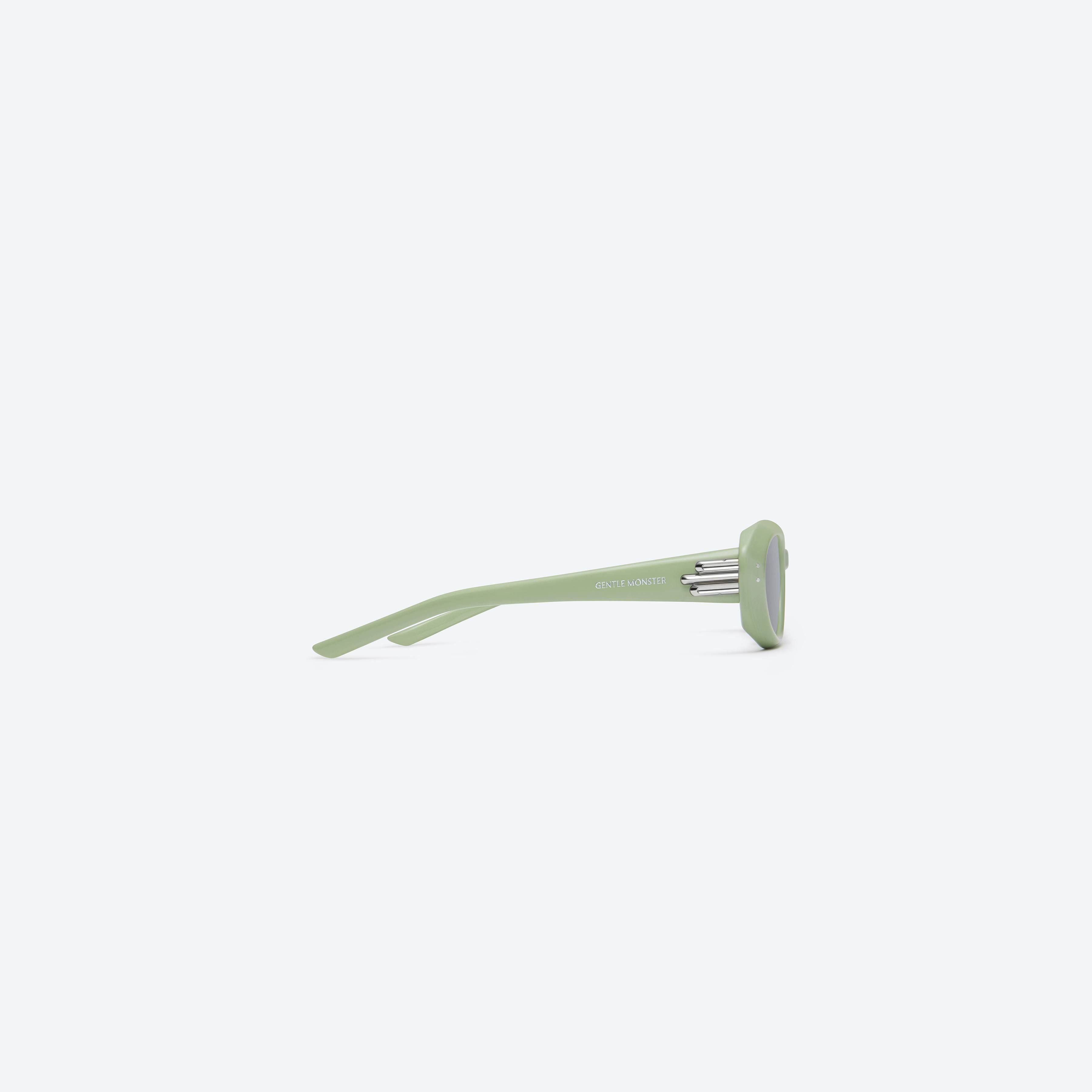 A detailed right view of Gentle Monster Blanc GR8 Green Acetate framed Oval sunglasses.