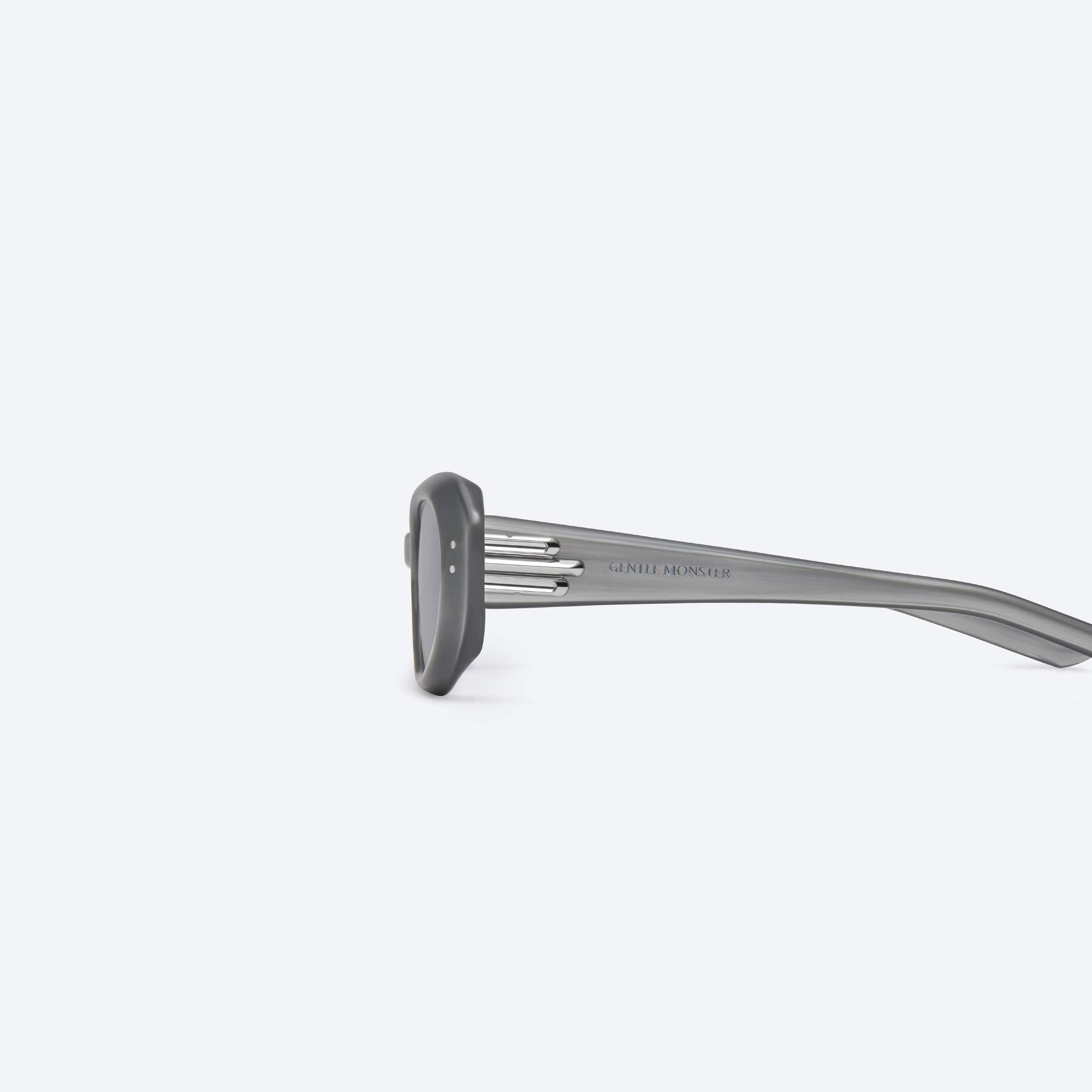 A detailed left view of Gentle Monster Blanc G13 Gray Acetate framed Oval sunglasses.