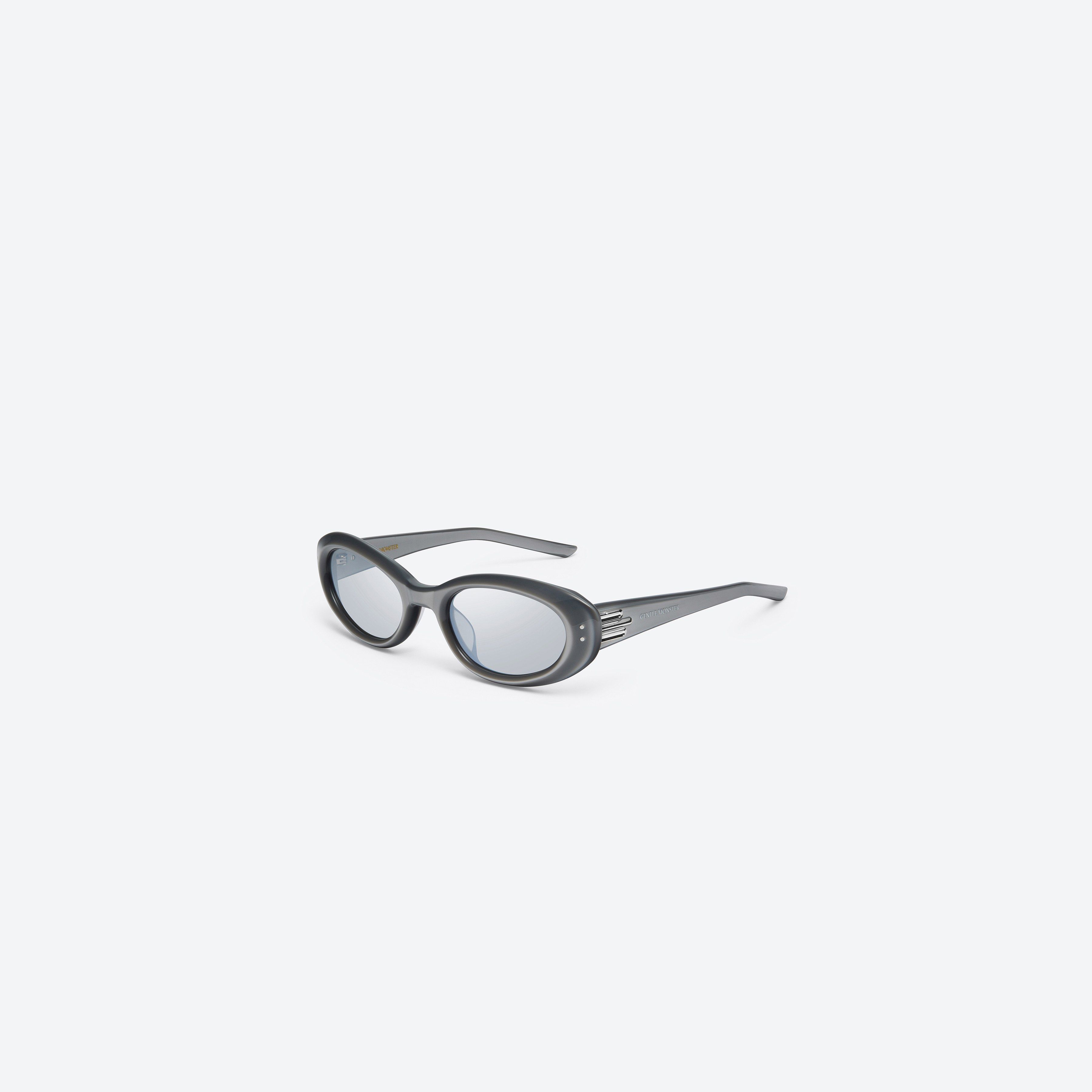 45-degree view of Gentle Monster Blanc G13 Gray Acetate framed Oval sunglasses.