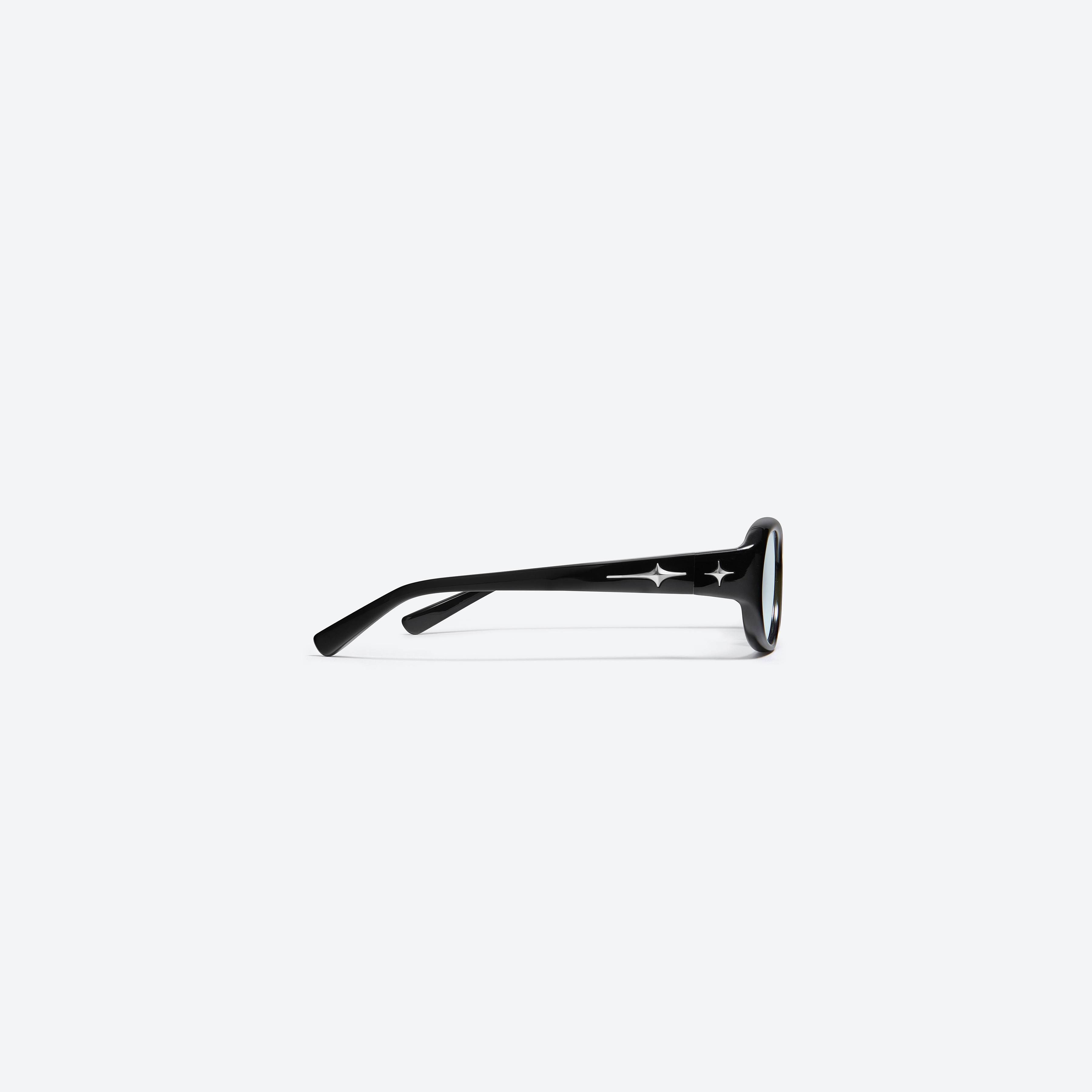 A detailed right view of Gentle Monster Rna 01(GR) Black Acetate framed Square glasses.