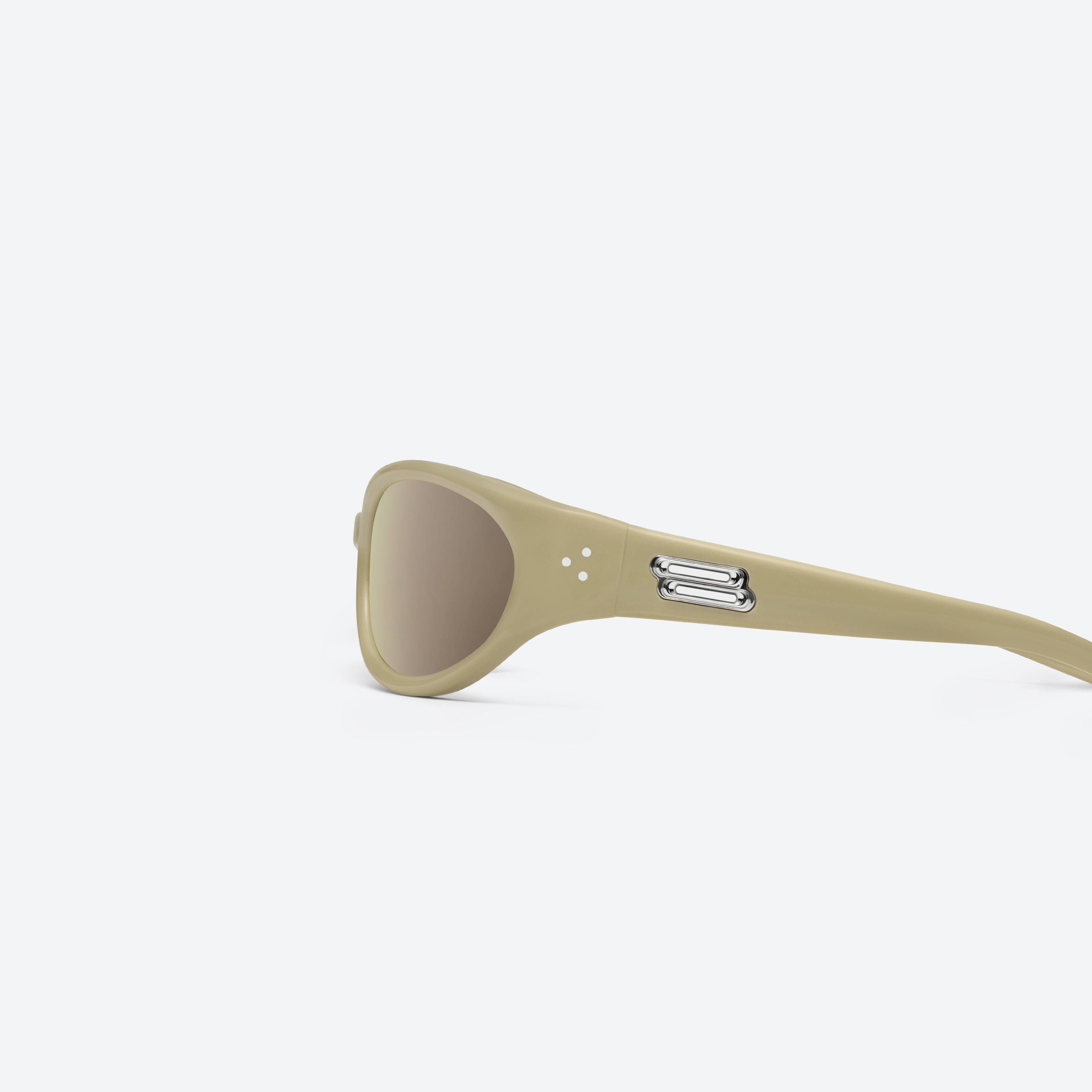 A detailed left view of Gentle Monster Young Y10 Yellow Acetate framed Wraparound sunglasses.