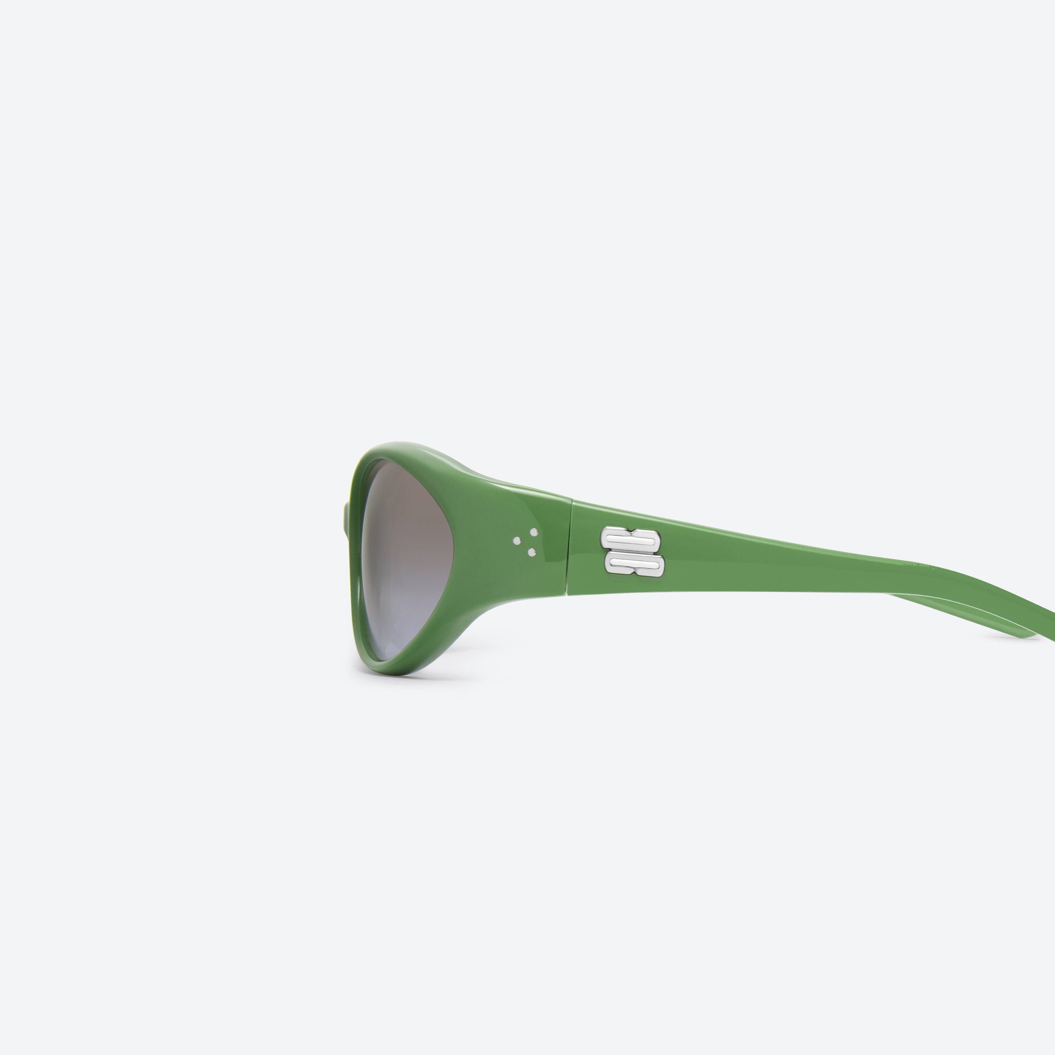 A detailed left view of Gentle Monster Sphere GR7 Green Acetate framed Wraparound sunglasses.