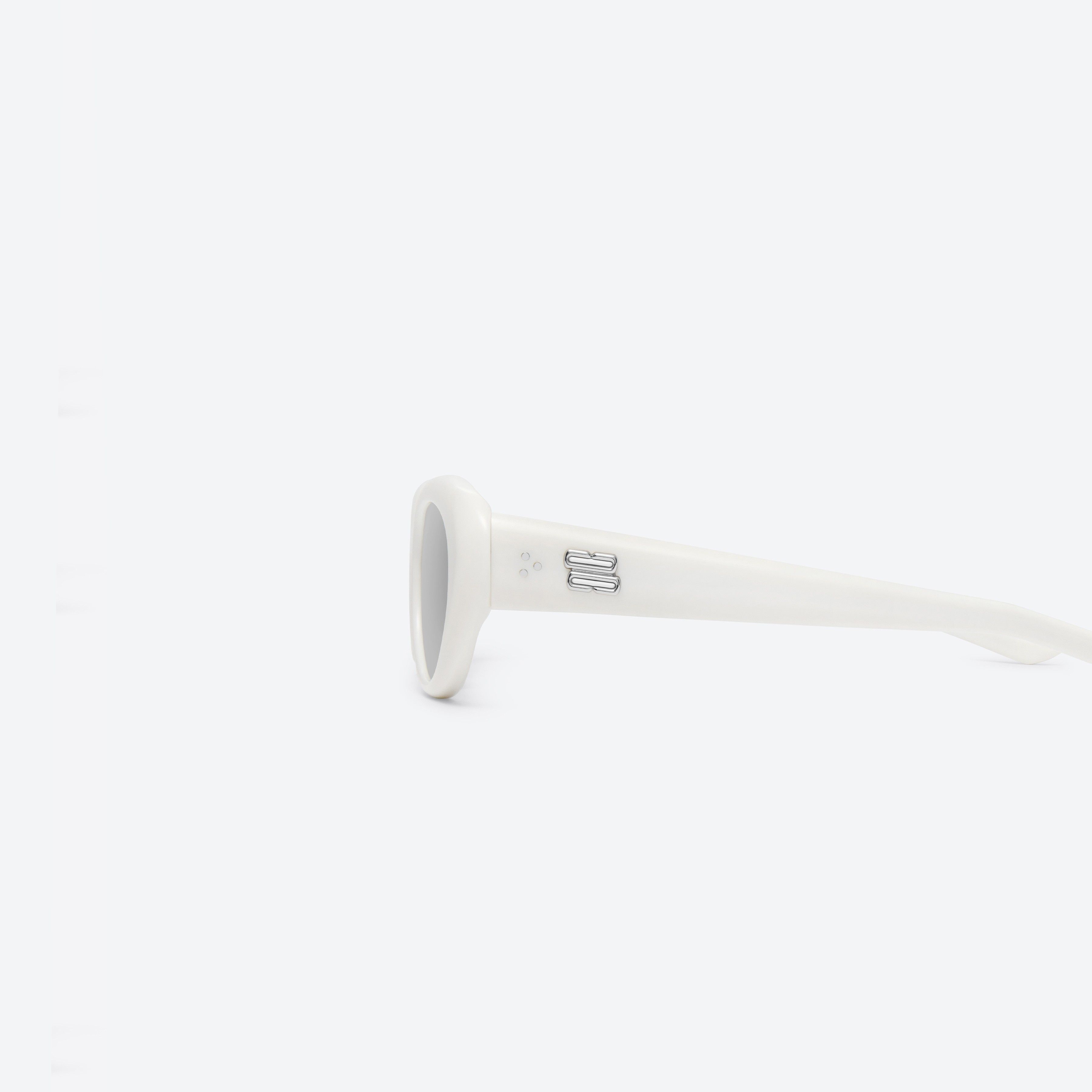 A detailed left view of Gentle Monster Umber W2 White Acetate framed Oval sunglasses.