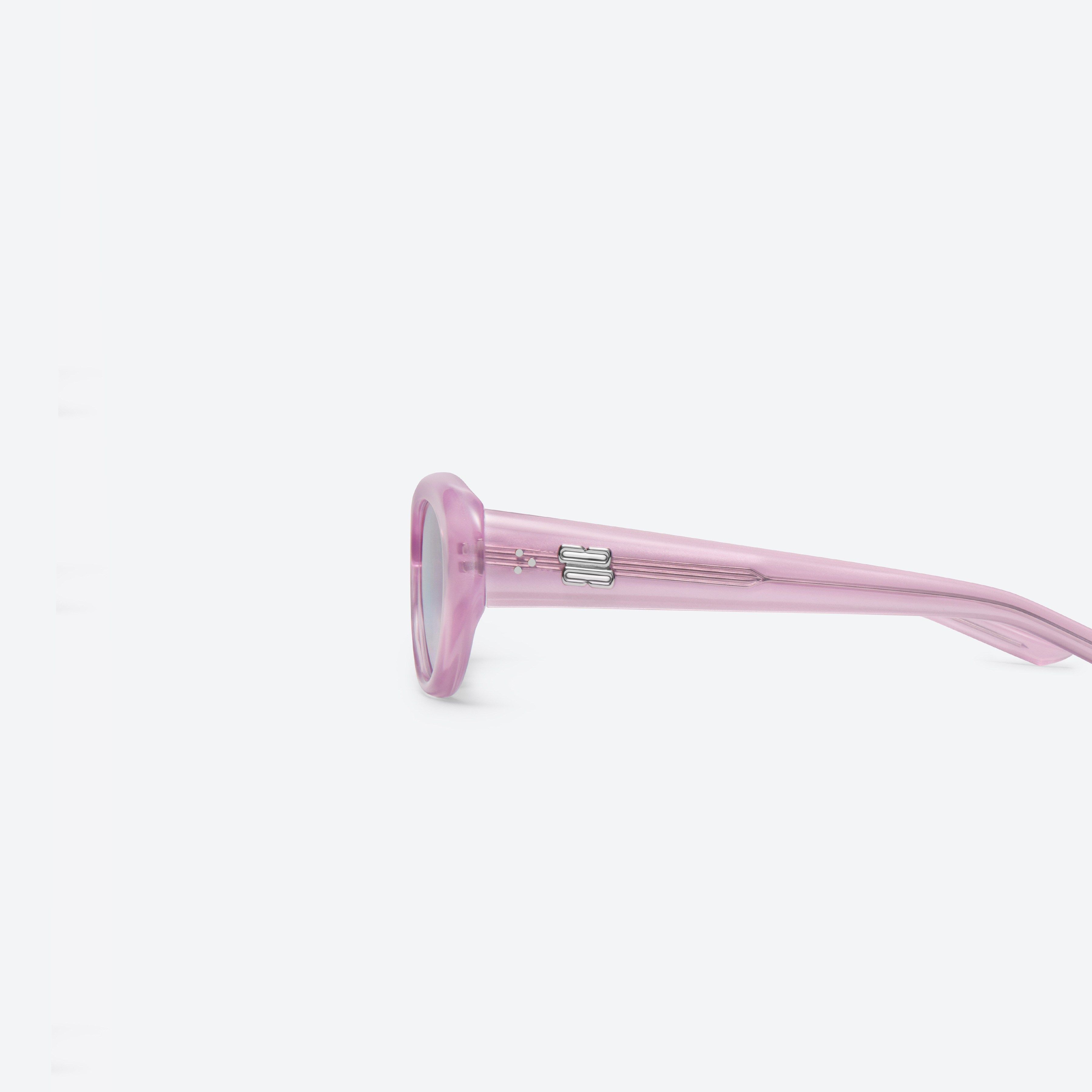 A detailed left view of Gentle Monster Umber PC9 Pink Acetate framed Oval sunglasses.