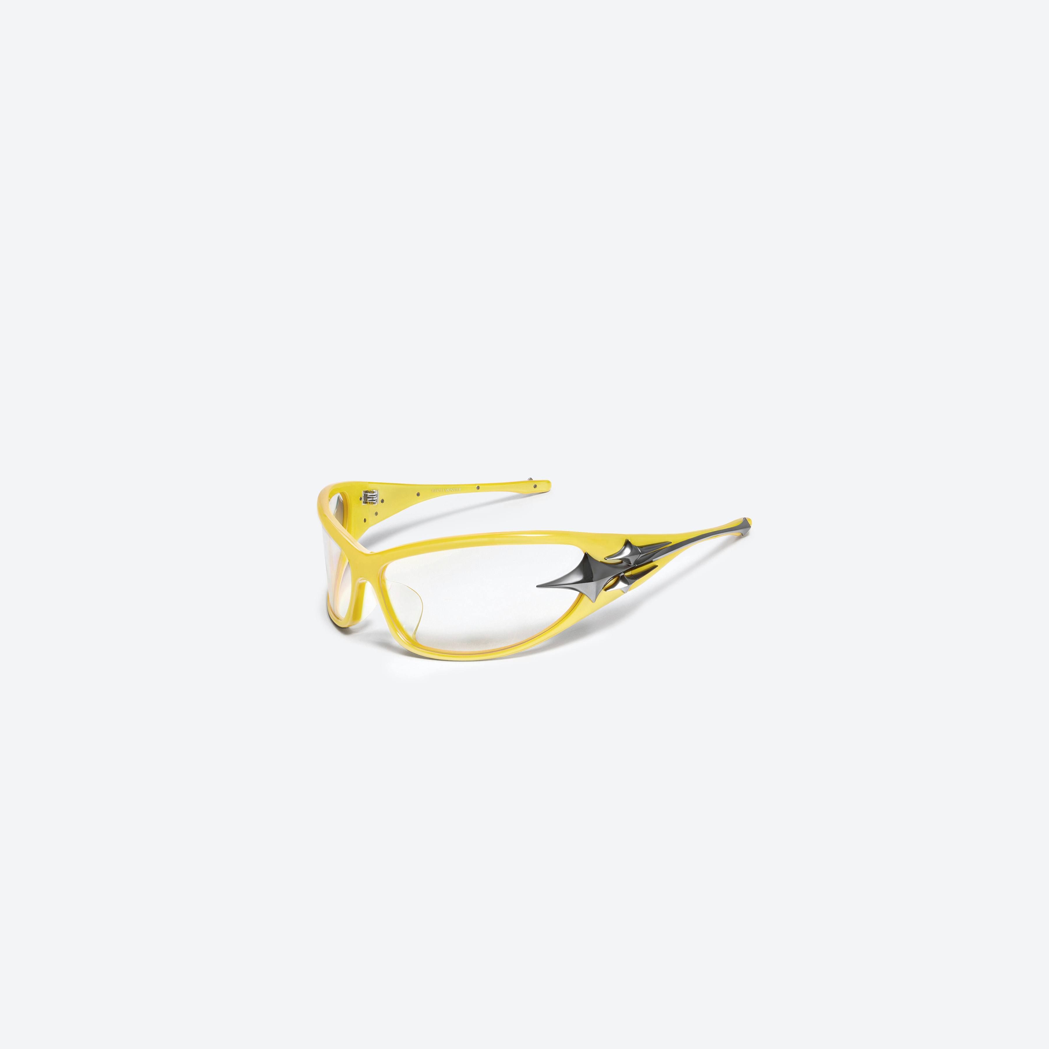 45-degree view of Gentle Monster Third Kind Y8 Yellow Acetate framed Wraparound glasses.