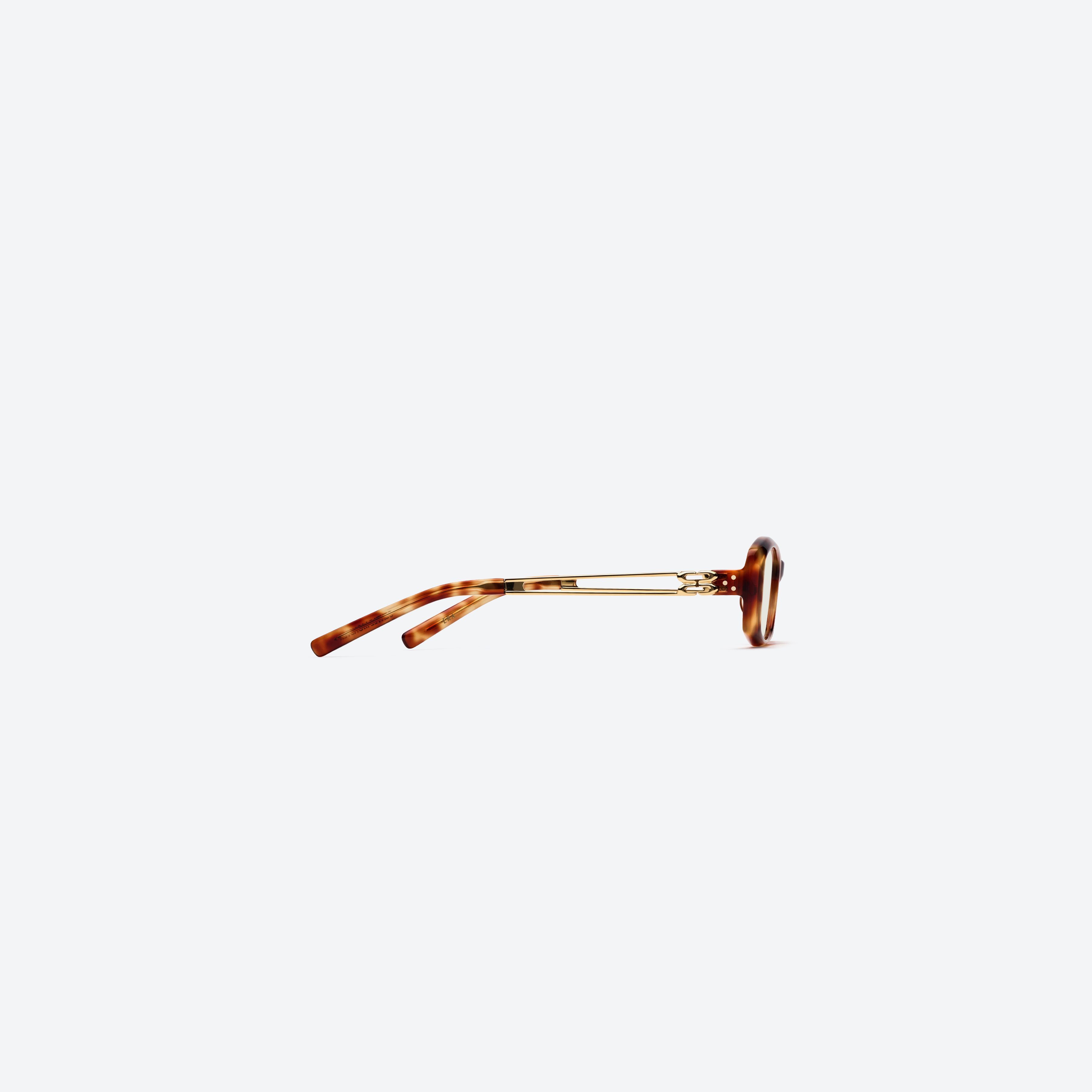 A detailed right view of Gentle Monster Era T7 Tortoise Mixed framed Square glasses.