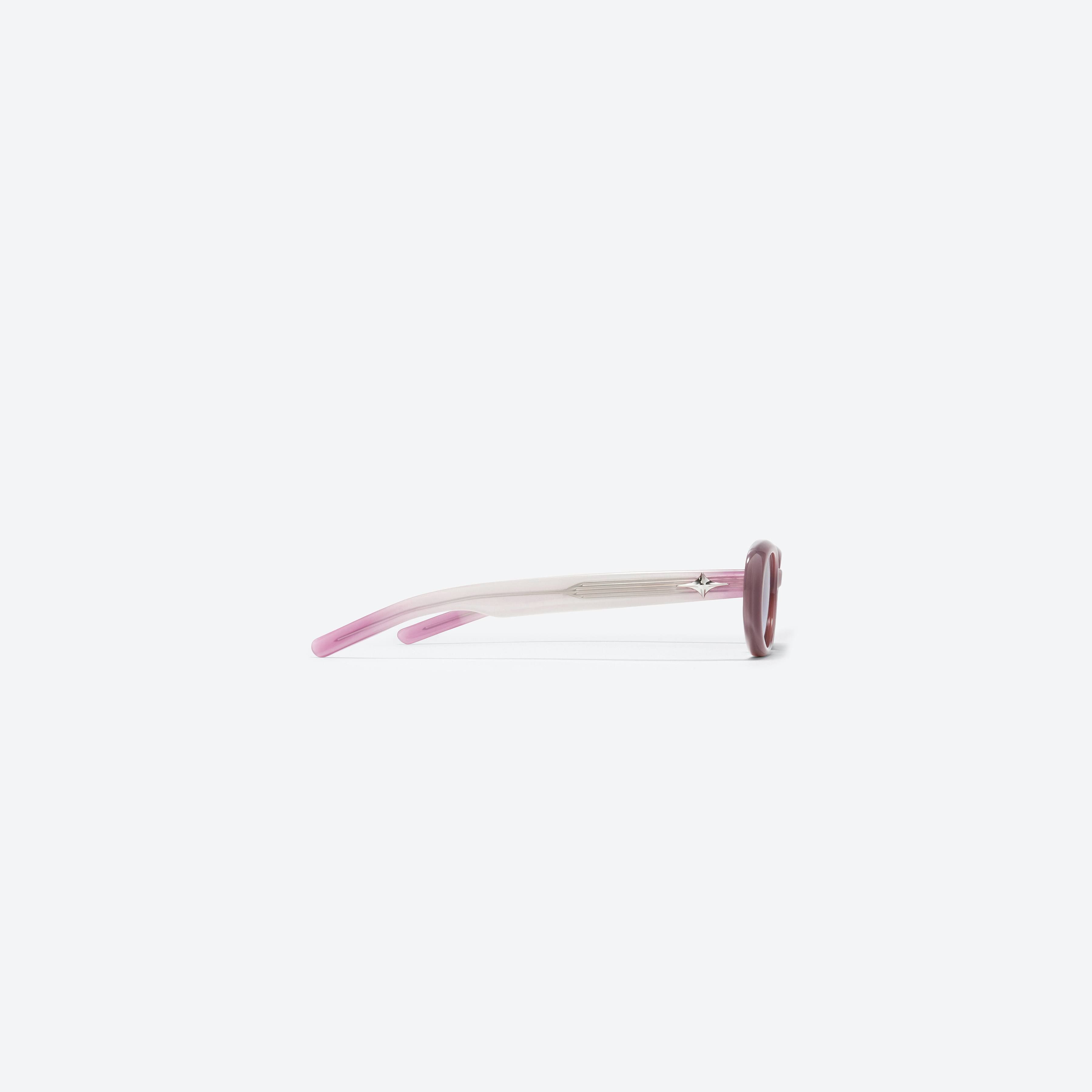 A detailed right view of Gentle Monster Bandoneon.S PC5 Pink Acetate framed Oval sunglasses.