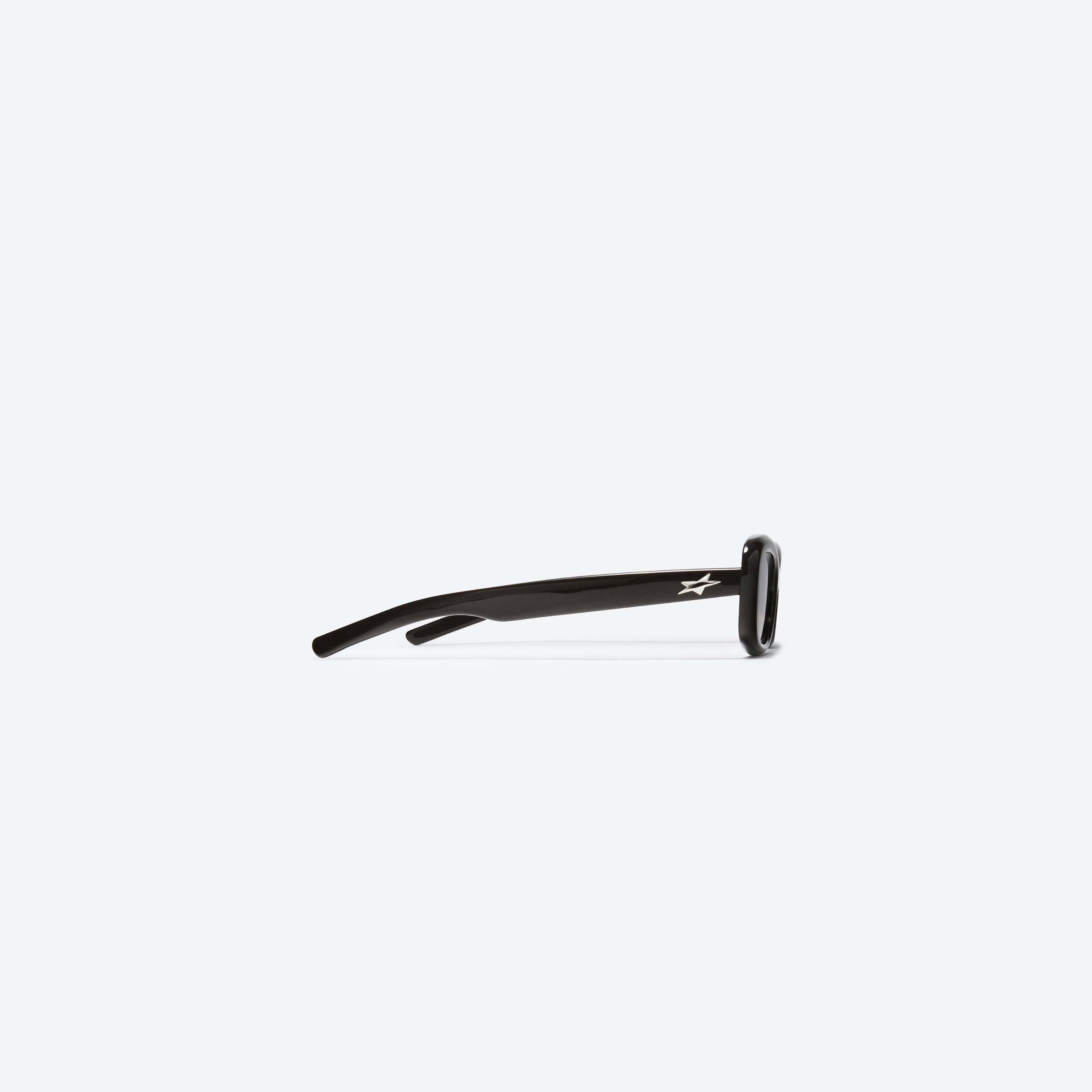 A detailed right view of Gentle Monster Oracle.S BR2 Brown Acetate framed Square sunglasses.