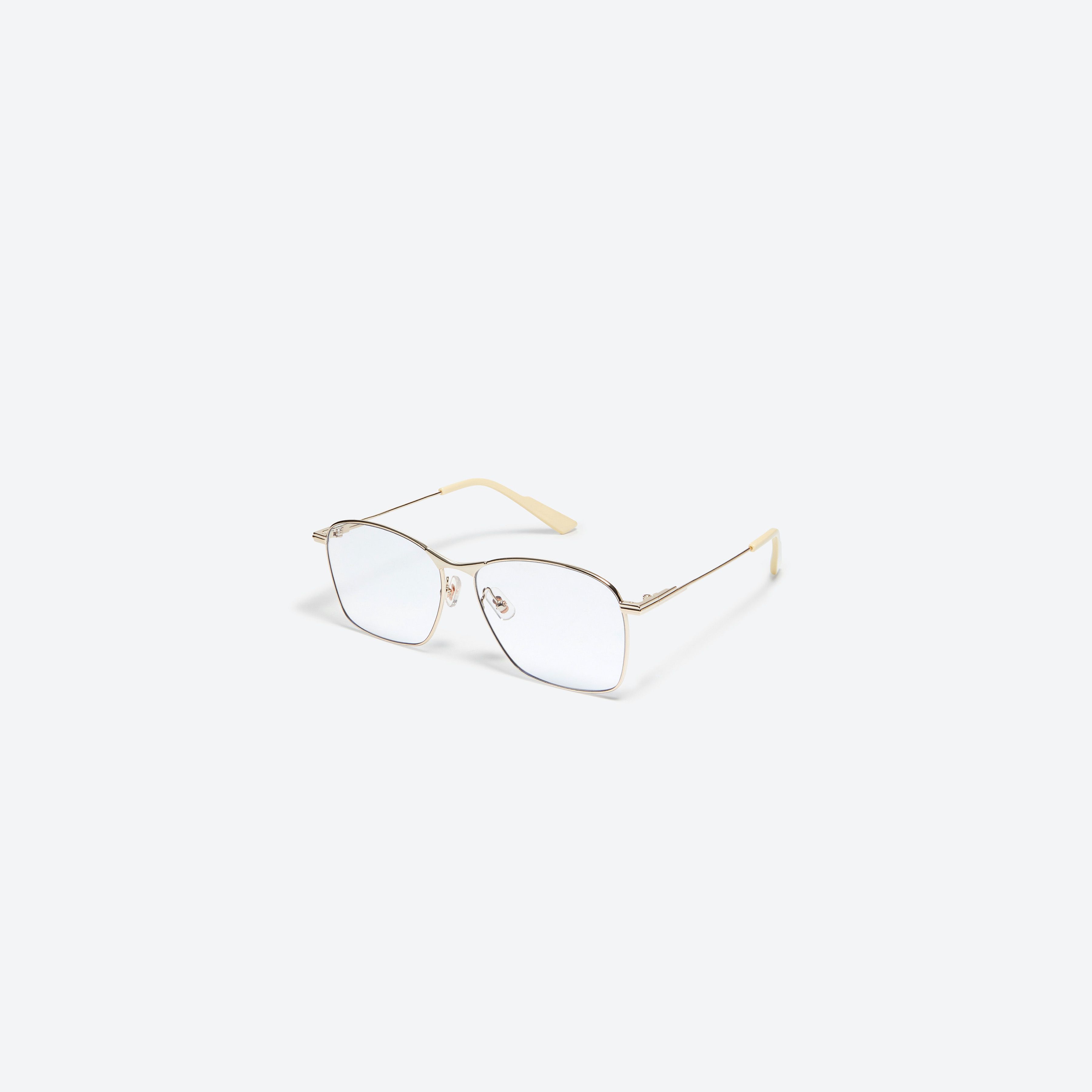 45-degree view of Gentle Monster Mora 031 Gold Metal framed Aviator sunglasses.