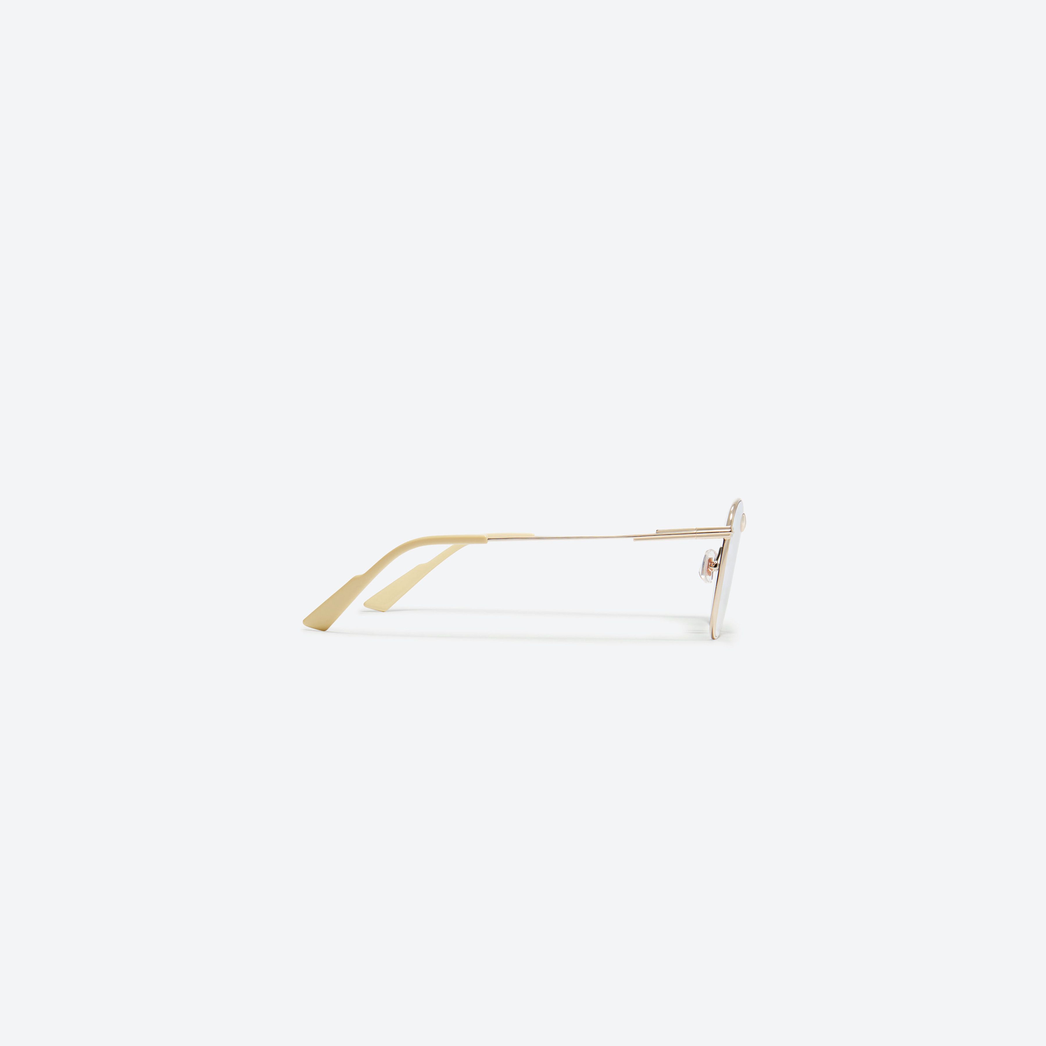 A detailed right view of Gentle Monster Mora 031 Gold Metal framed Aviator sunglasses.