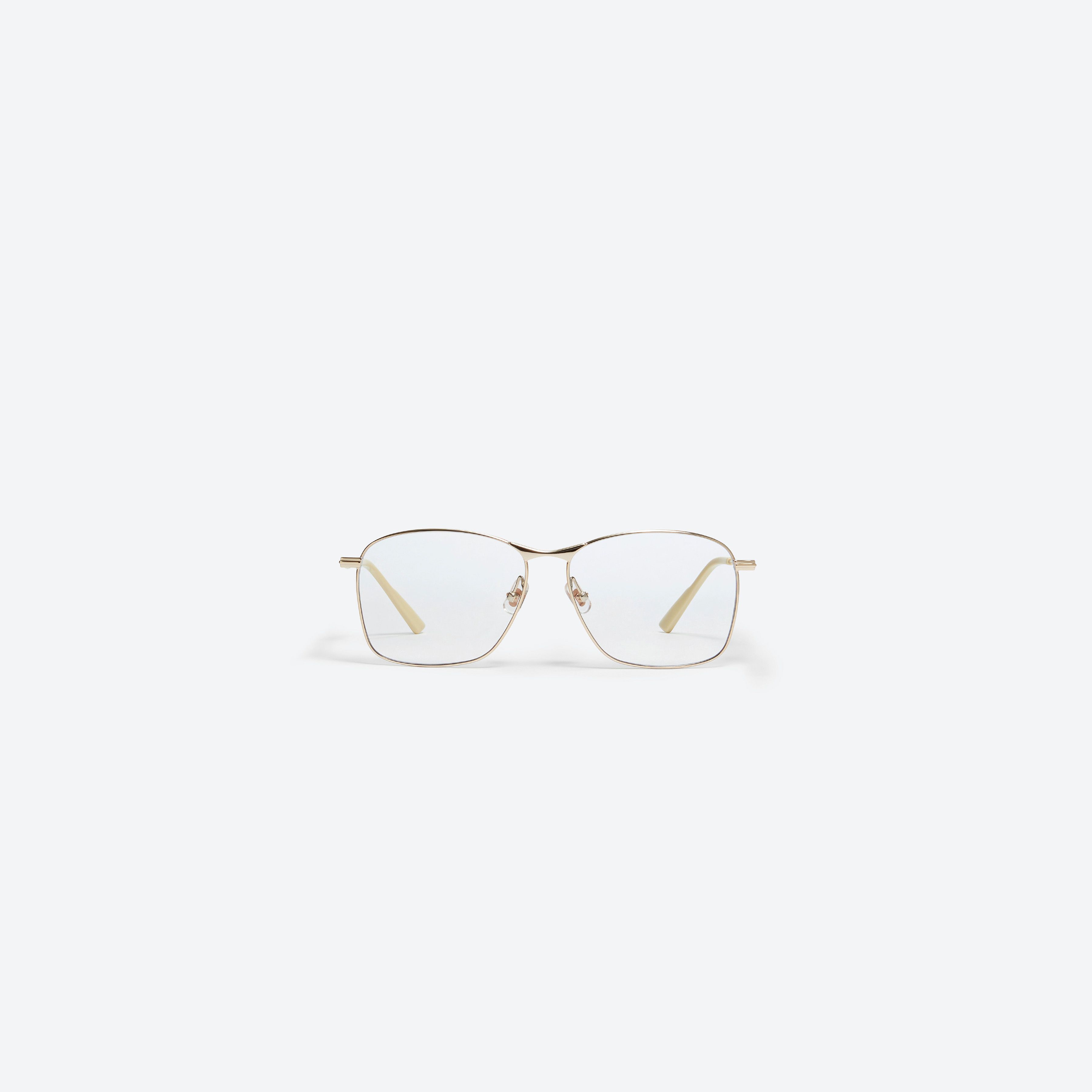 A front view of Gentle Monster Mora 031 Gold Metal framed Aviator sunglasses.