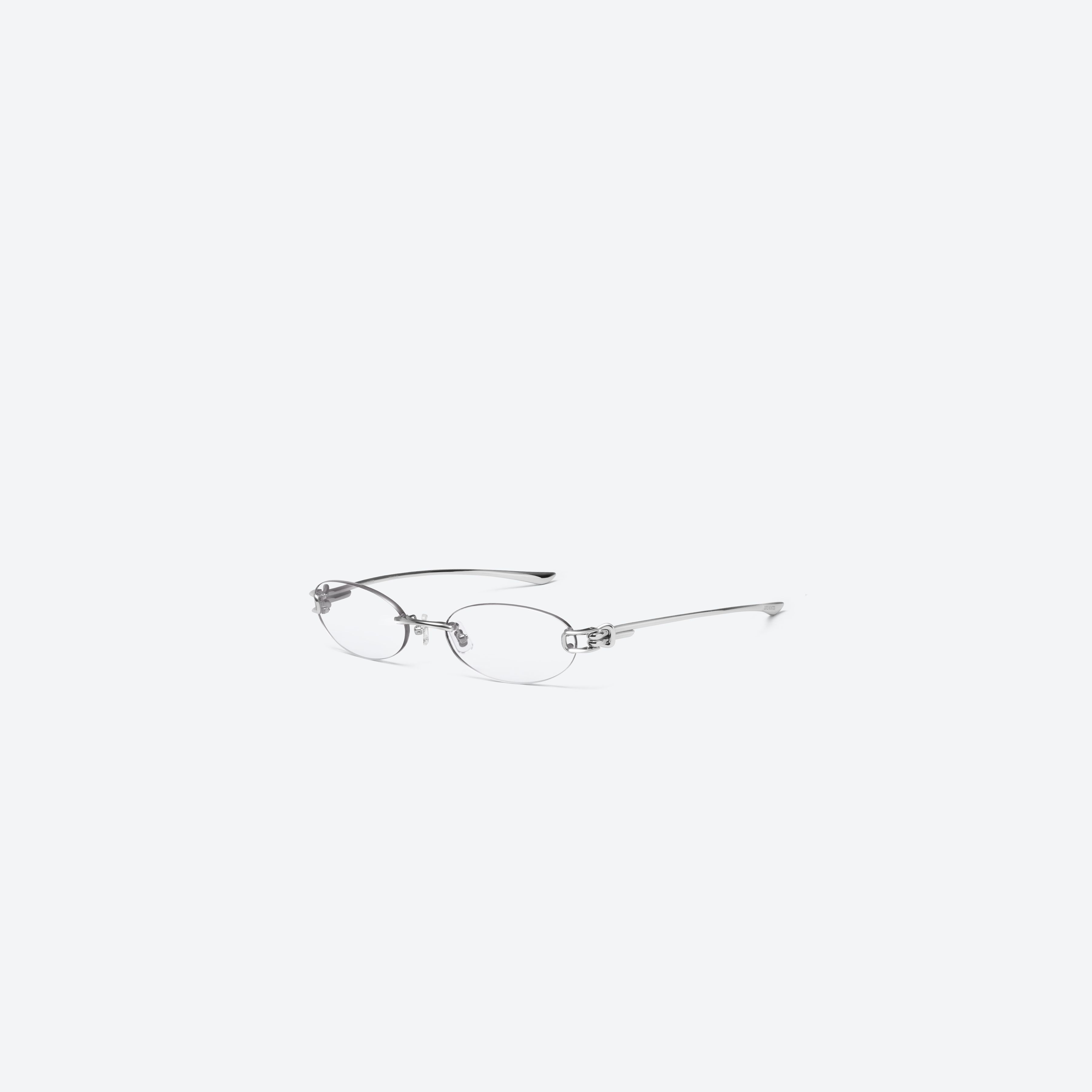 45-degree view of Gentle Monster Musubi 02 Silver Metal framed Oval glasses.
