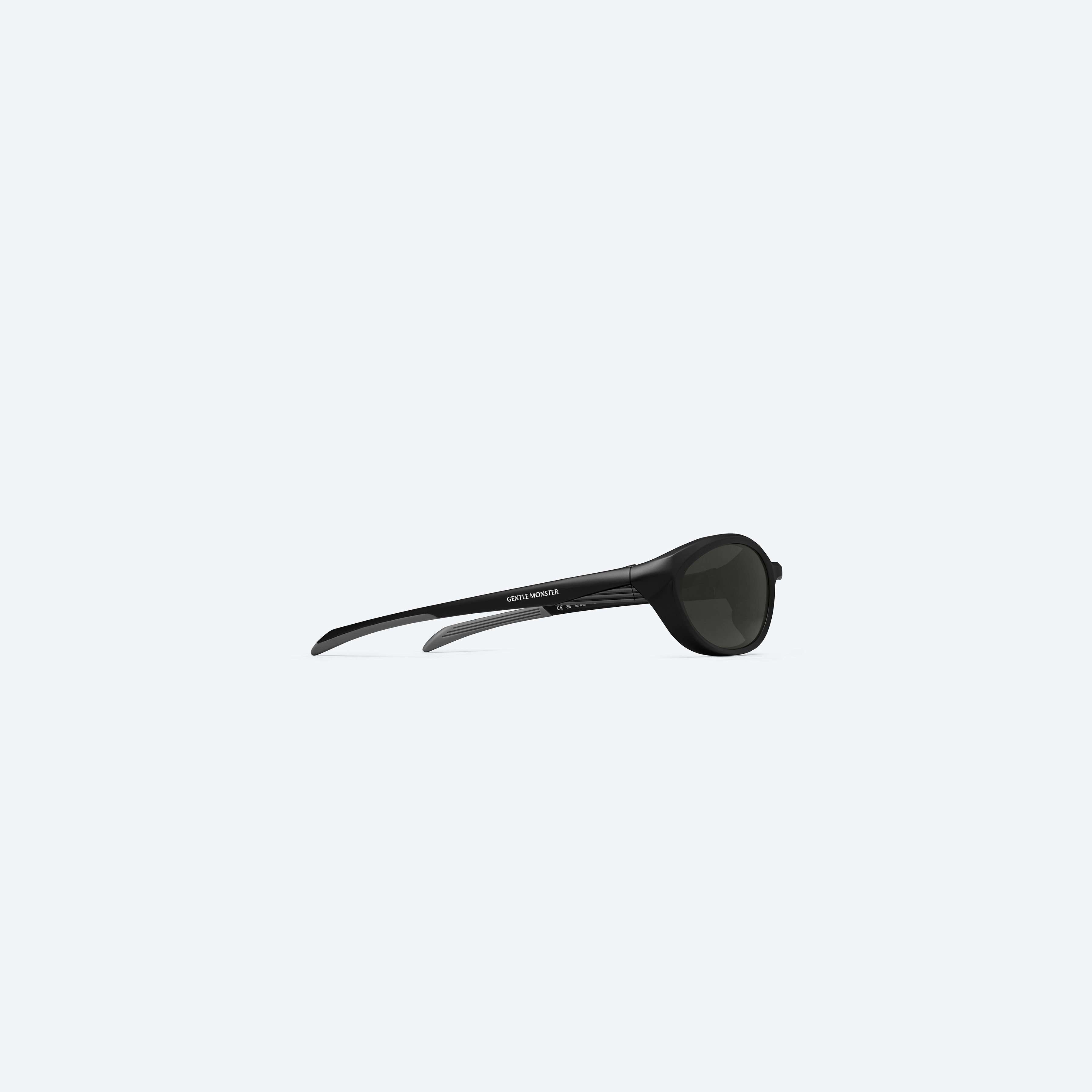 A detailed right view of Gentle Monster Rim M01 Black Nylon framed Wraparound sunglasses.