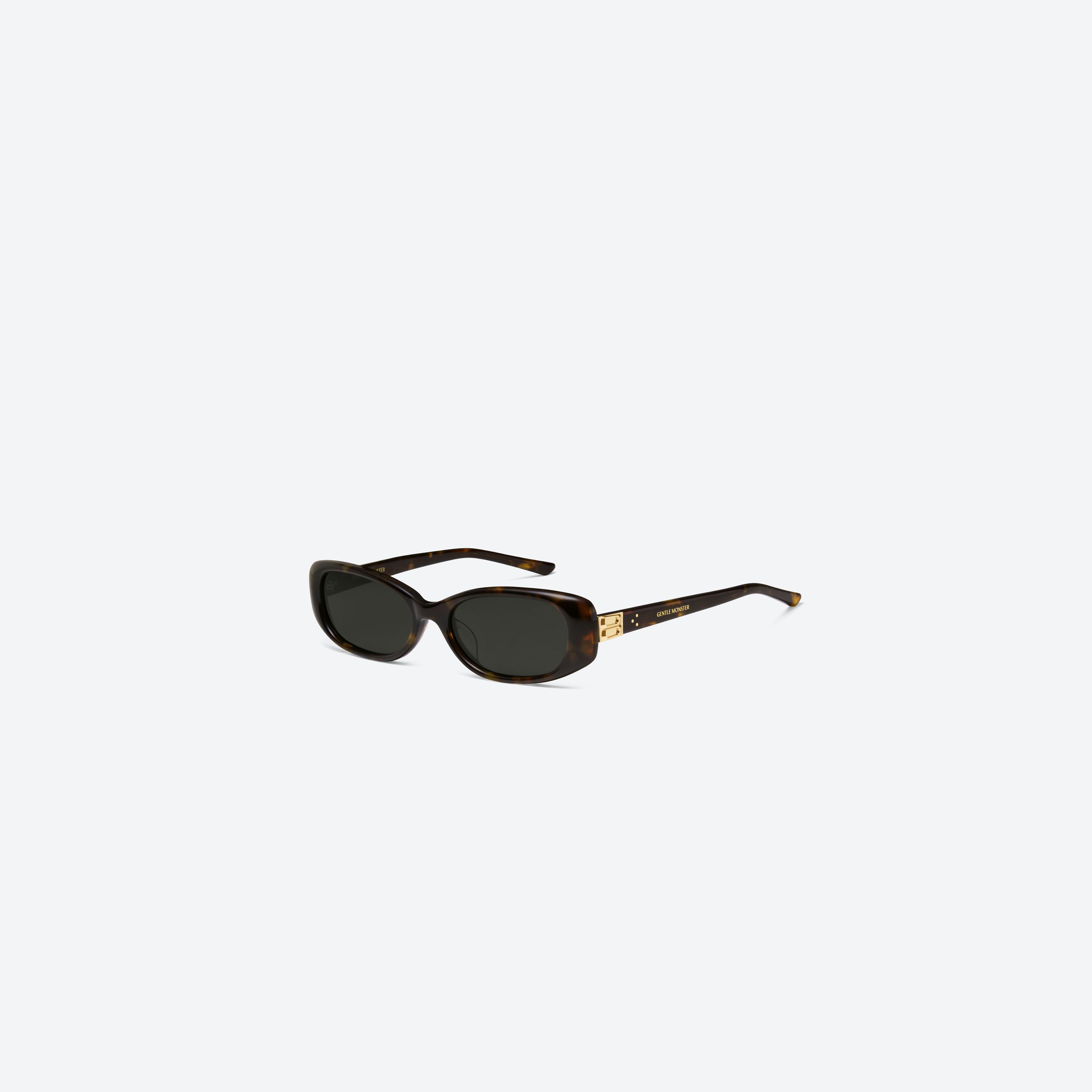 45-degree view of Gentle Monster Dust Musk T1 Tortoise Acetate framed Square sunglasses.