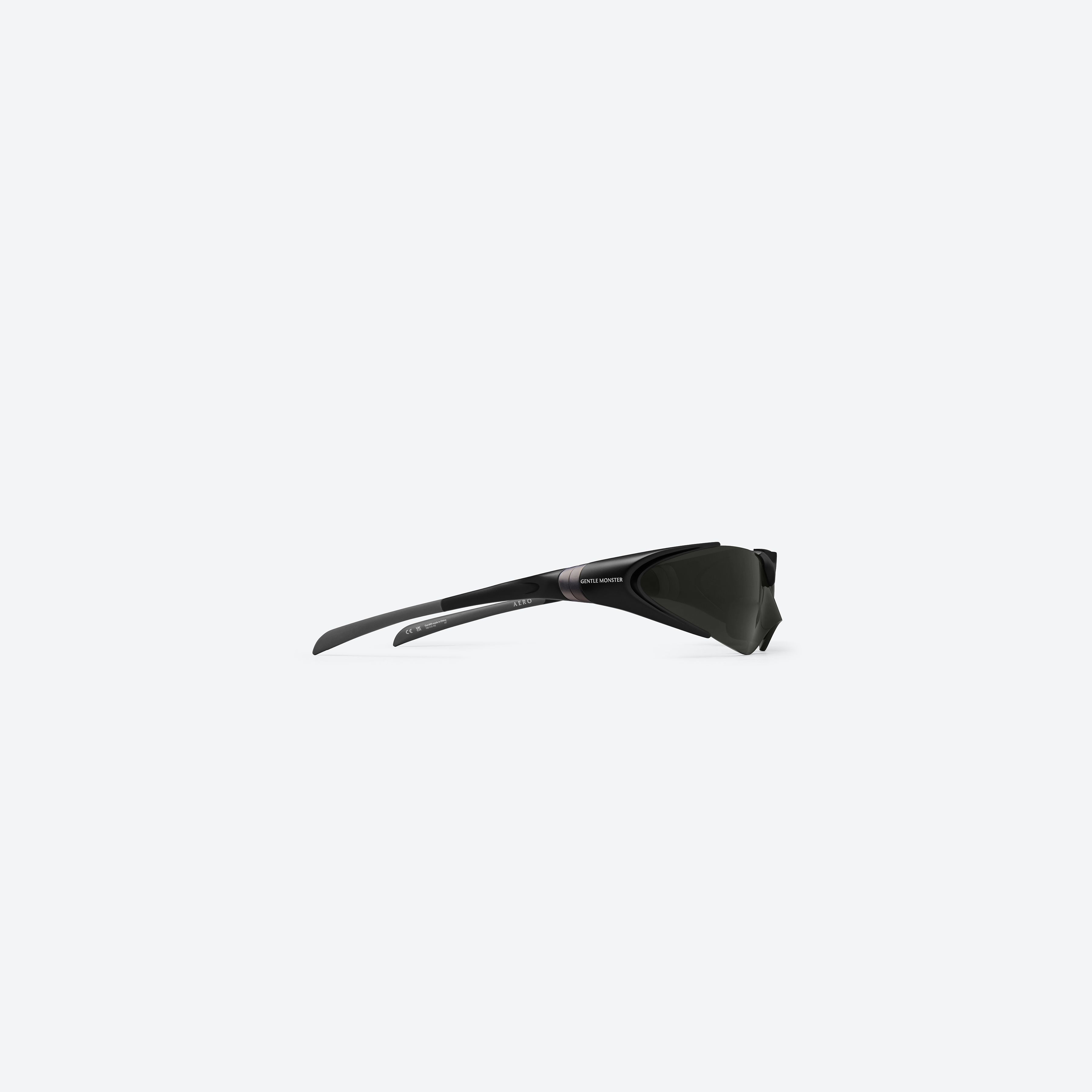 A detailed right view of Gentle Monster Disney F1 - Aero M01 Black Nylon framed Wraparound sunglasses.