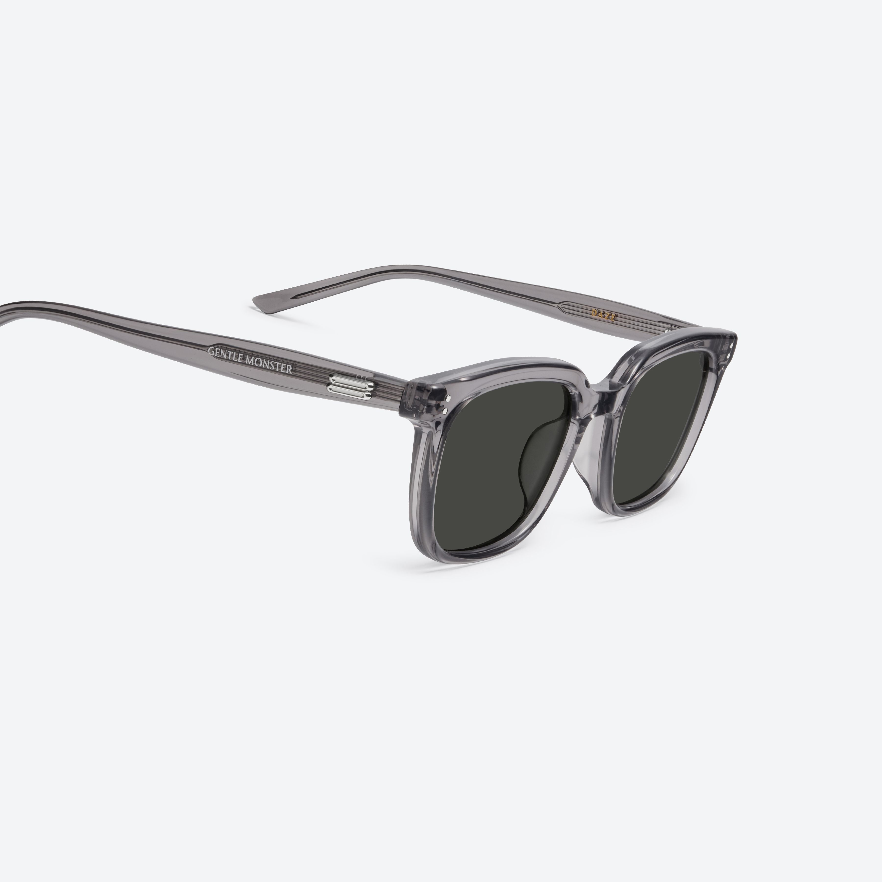 45-degree detailed view of Gentle Monster Daze GC12 Gray Acetate framed Square sunglasses.