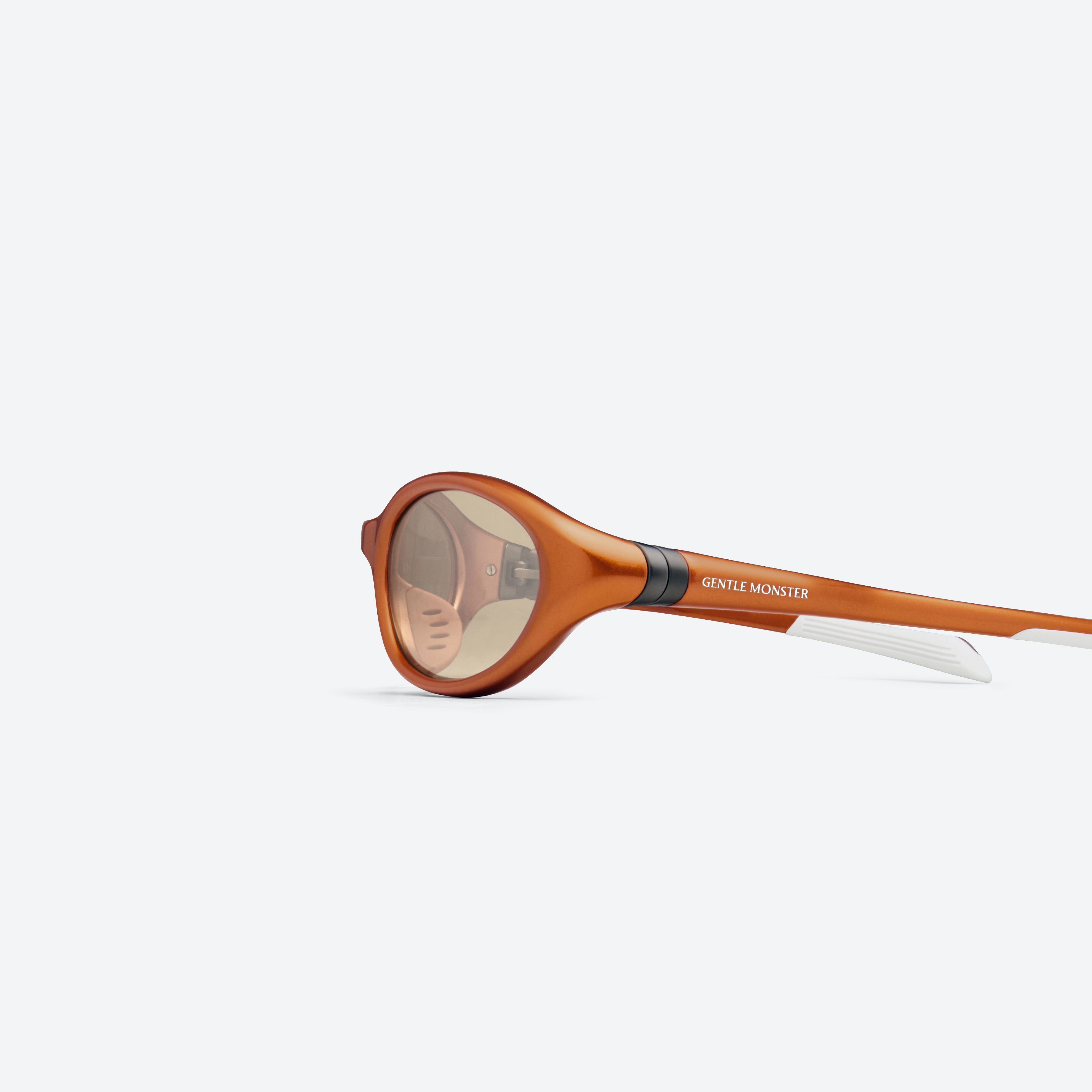 A detailed left view of Gentle Monster Velo OR4 Orange Nylon framed Wraparound sunglasses.