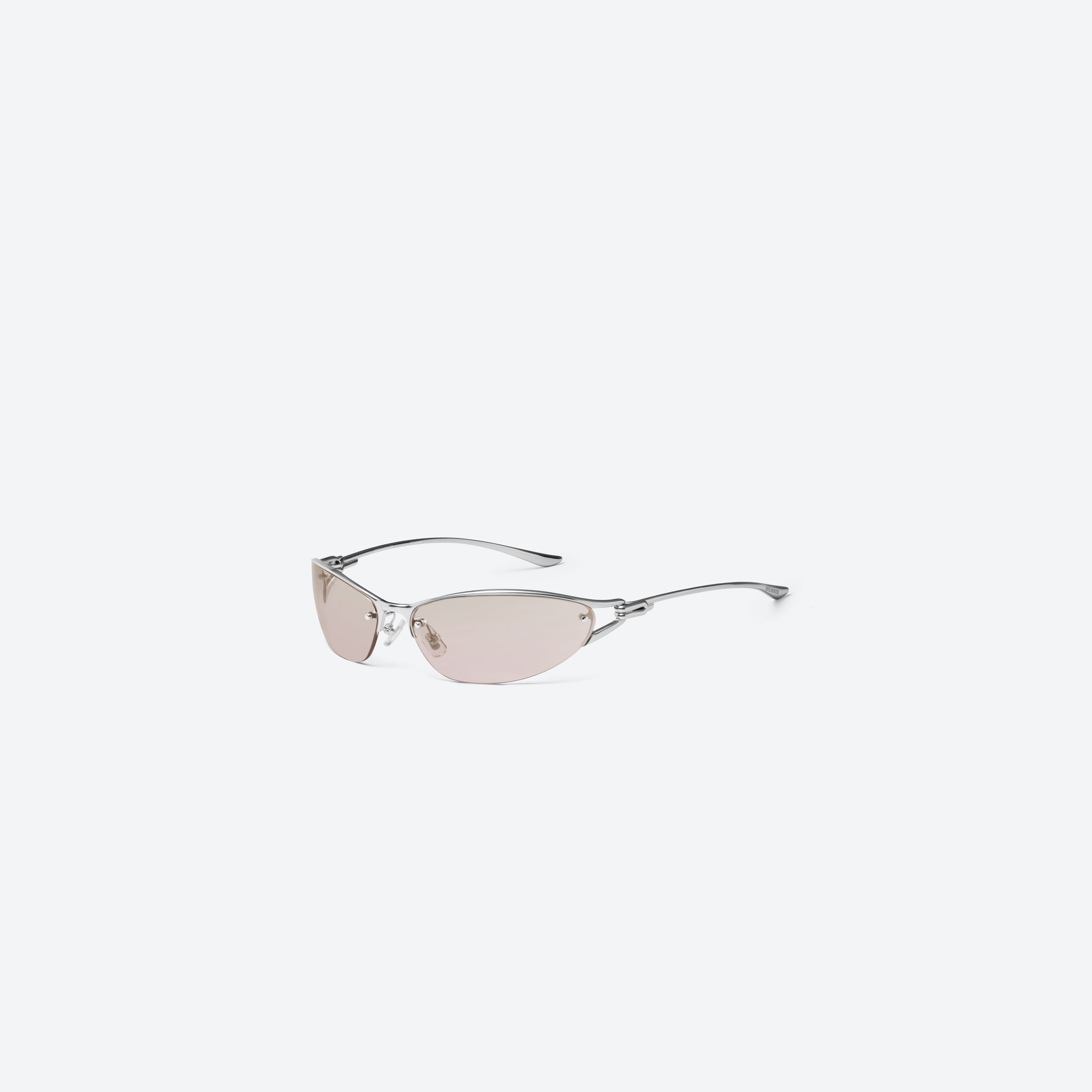 45-degree view of Gentle Monster Futura 02(BRG) Silver Metal framed Wraparound sunglasses.