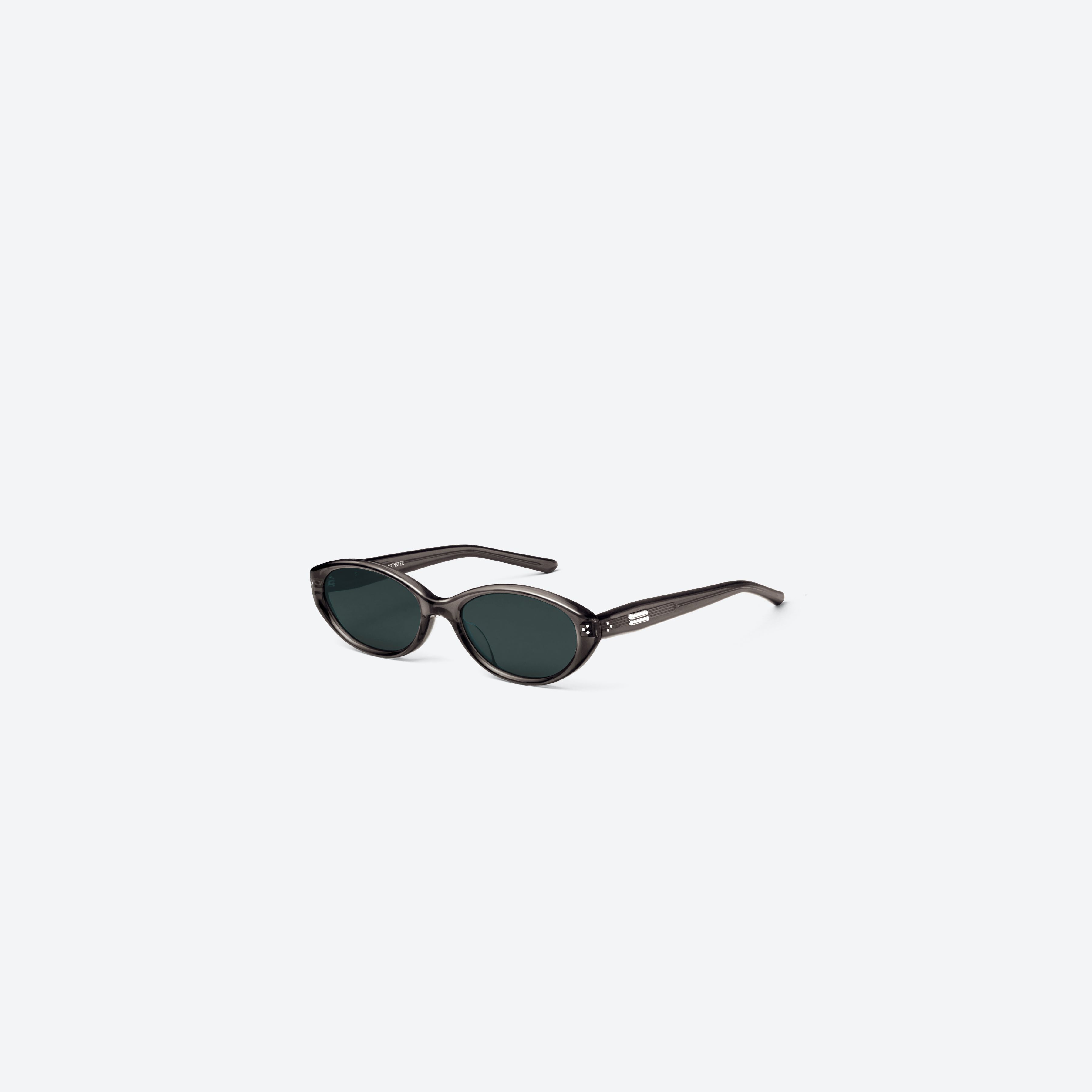 45-degree view of Gentle Monster Cuscus BRC21 Brown Acetate framed Oval sunglasses.