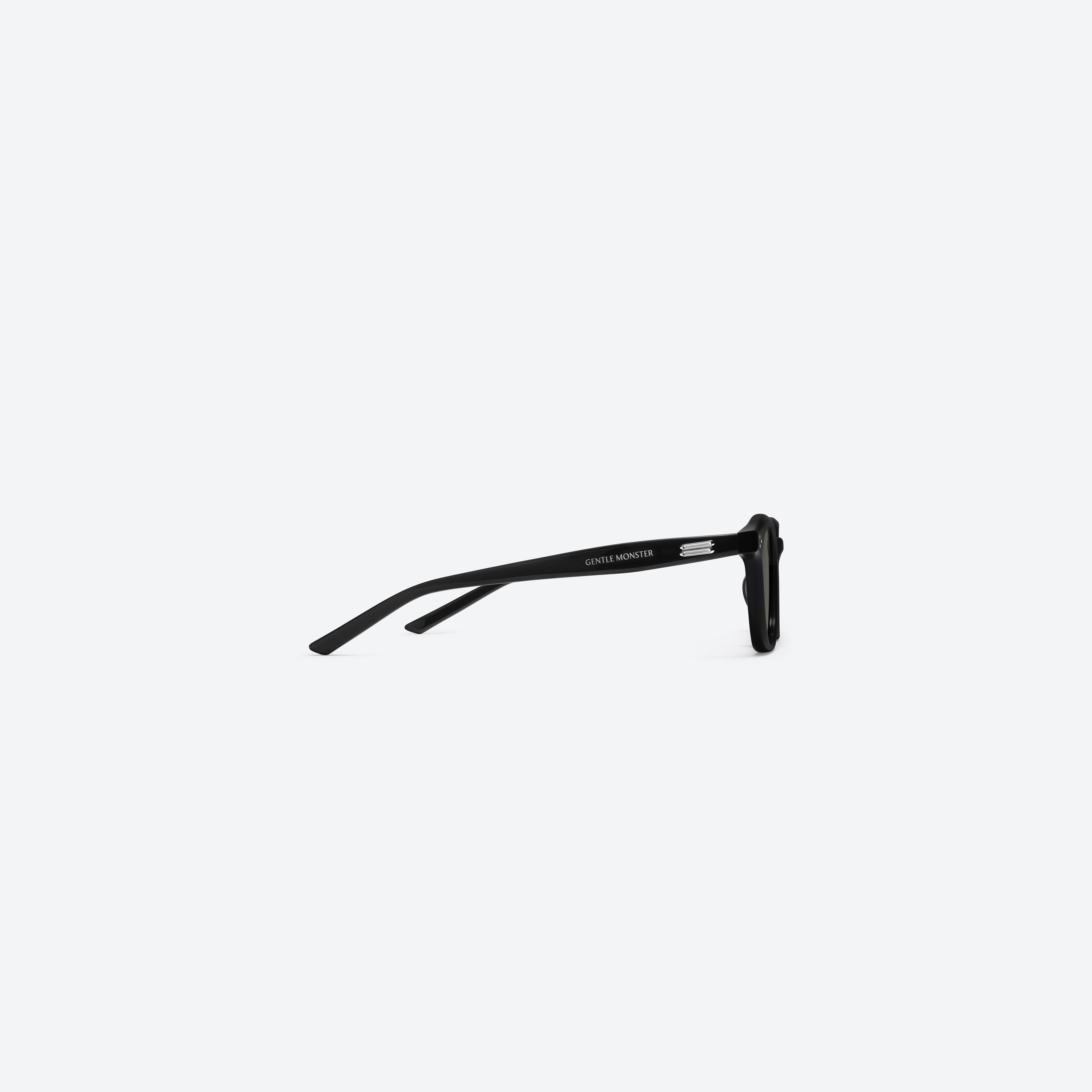 A detailed right view of Gentle Monster Noho 01 Black Acetate framed Round sunglasses.